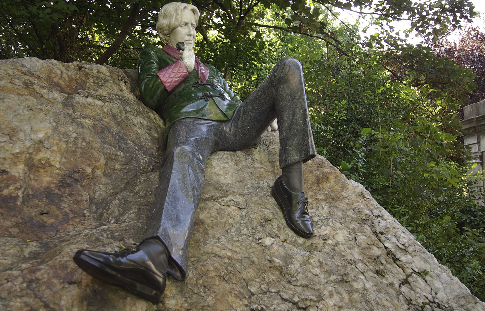Blackrock and Dublin, Ireland - 24th September 2007: The statue of Oscar Wilde, lying on a rock just off Merrion Square, Dublin