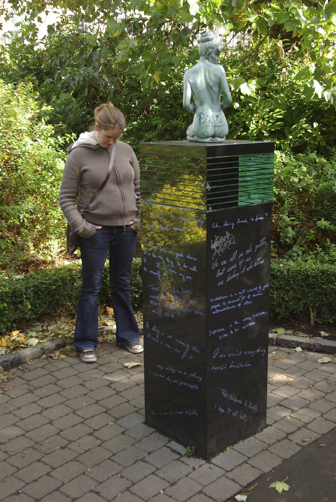Blackrock and Dublin, Ireland - 24th September 2007: Looking at a plinth covered in Oscar Wilde quotes in Archbishop Ryan Park, Merrion Square