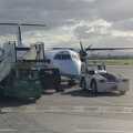 At Dublin Airport, Nosher's plane (a Dash 8) awaits