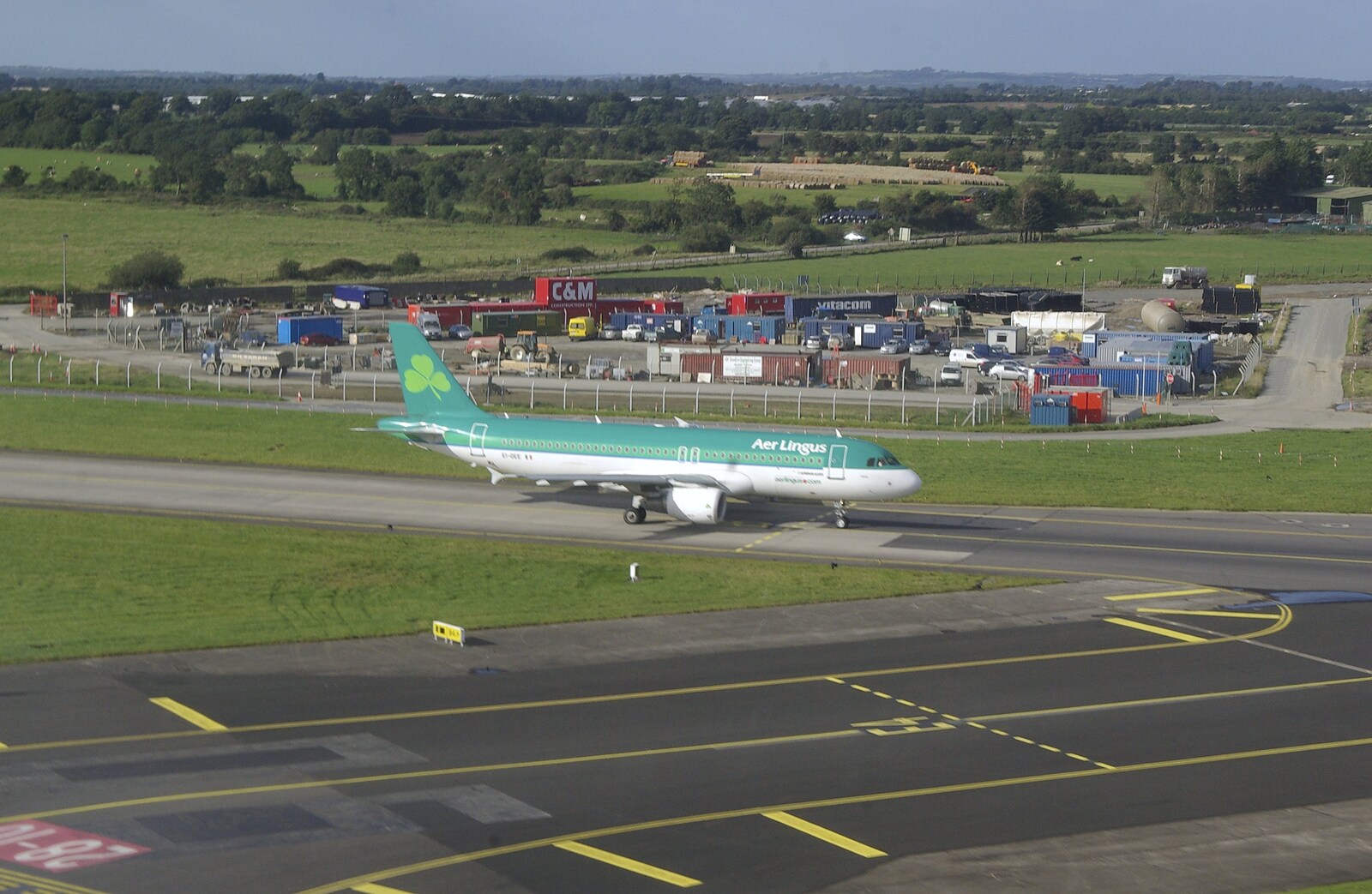 Blackrock and Dublin, Ireland - 24th September 2007: As we take off, an Aer Lingus taxis along to the gate