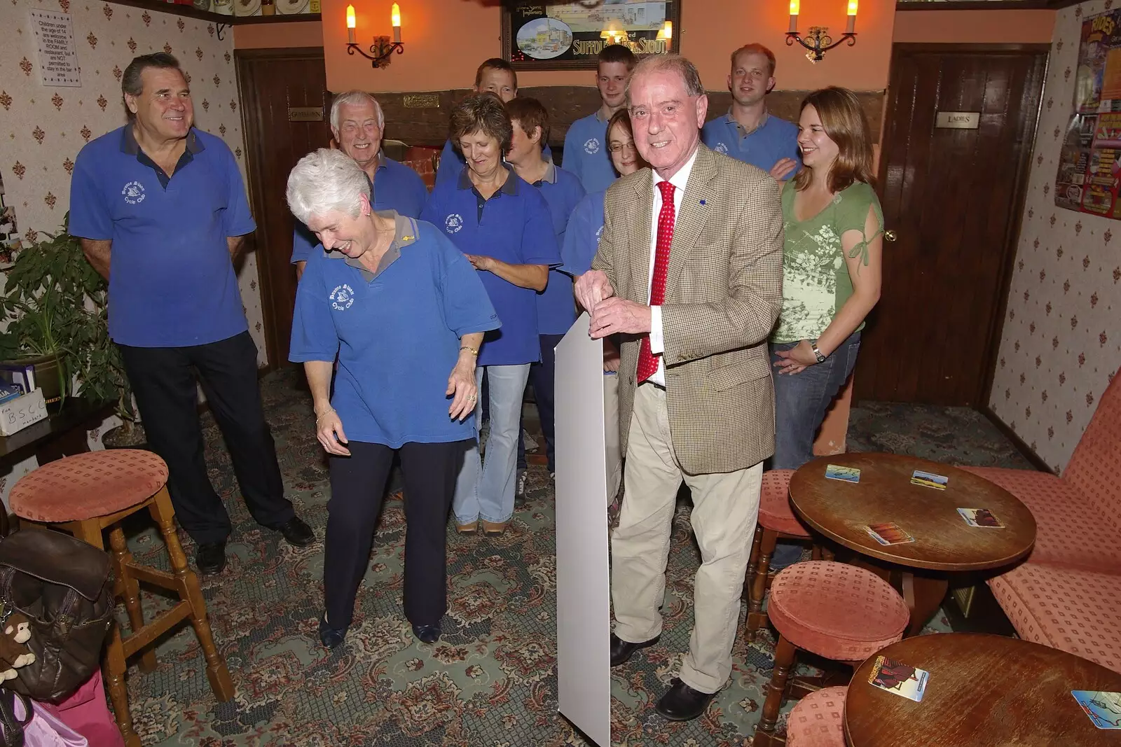 The Motor Neurone rep hauls the cheque away, from A BSCC Presentation, and Matt's Wedding Reception, Solihull - 6th October 2007