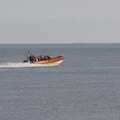 The inshore lifeboat runs about