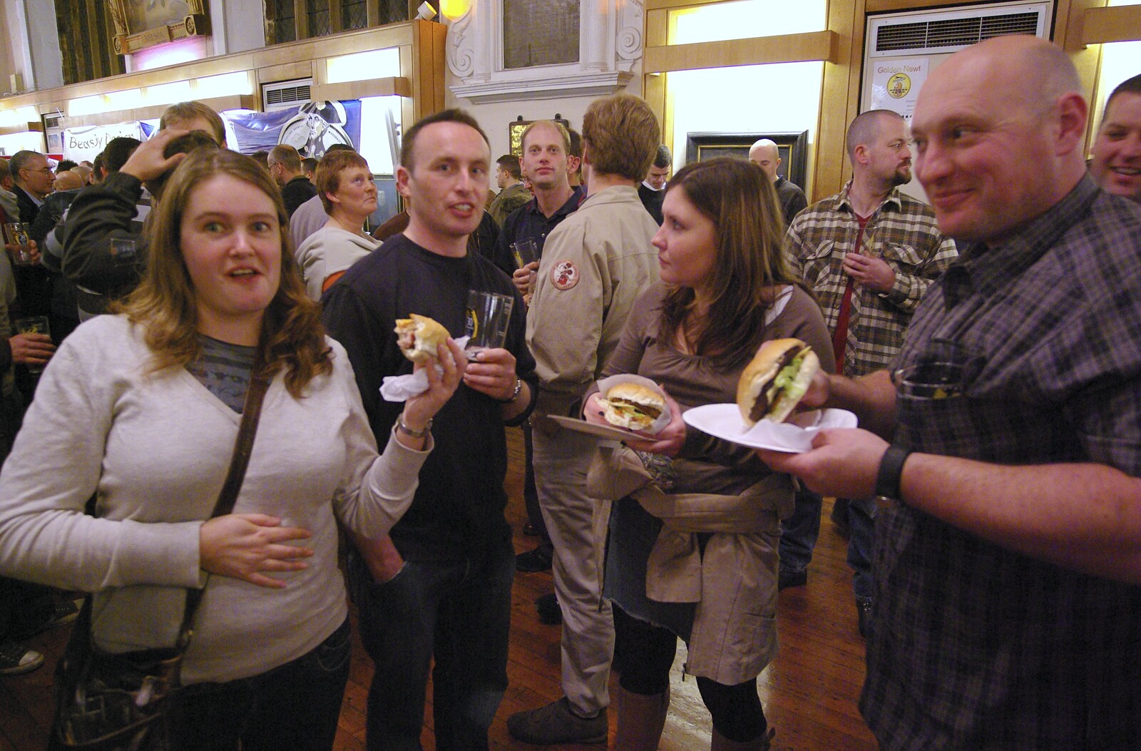 Isobel scoffs a burger from The Brome Swan at the 30th Norwich Beer Festival, Norfolk - 24th October 2007