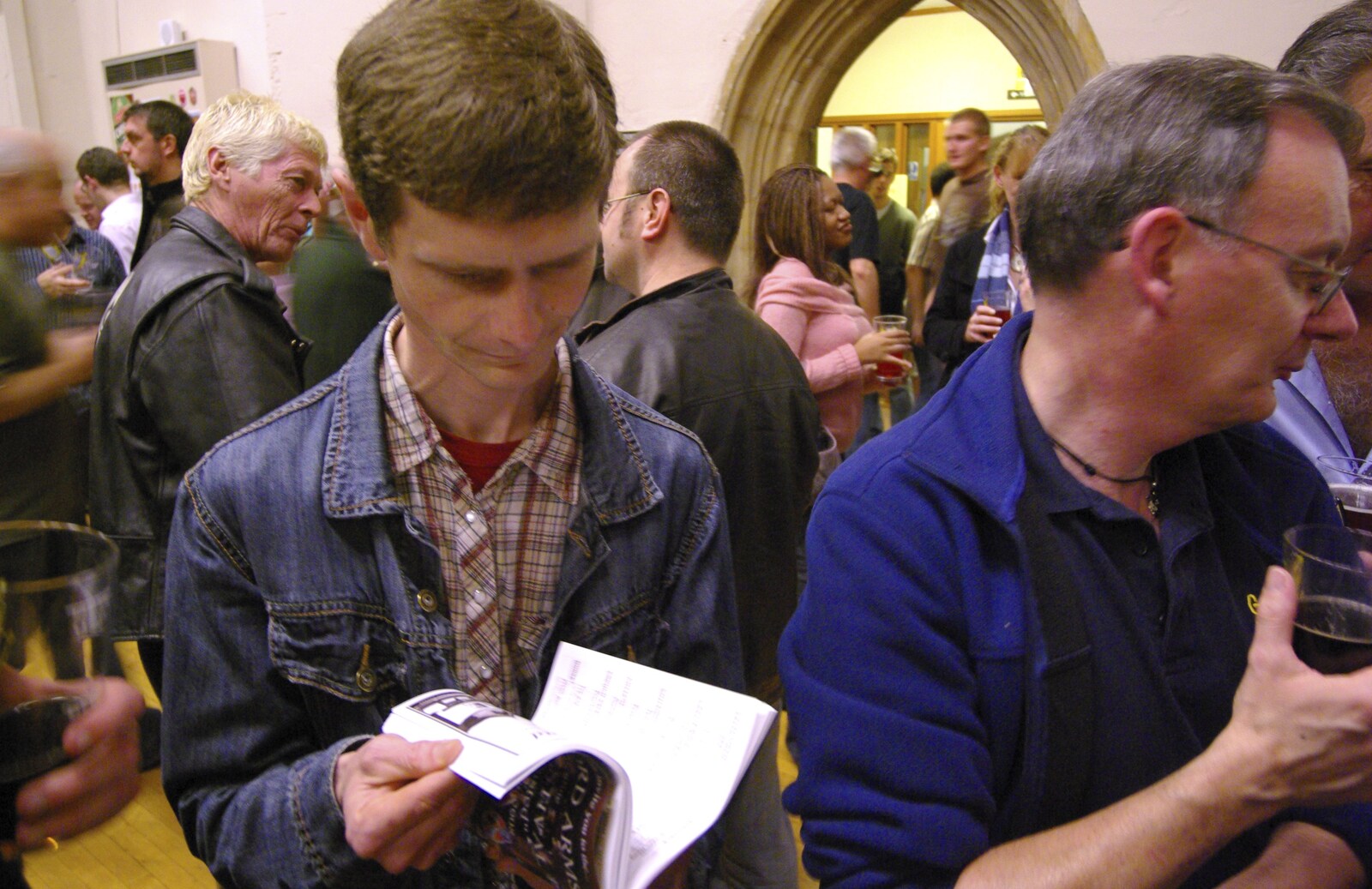 Ninja M reads the beer list from The Brome Swan at the 30th Norwich Beer Festival, Norfolk - 24th October 2007