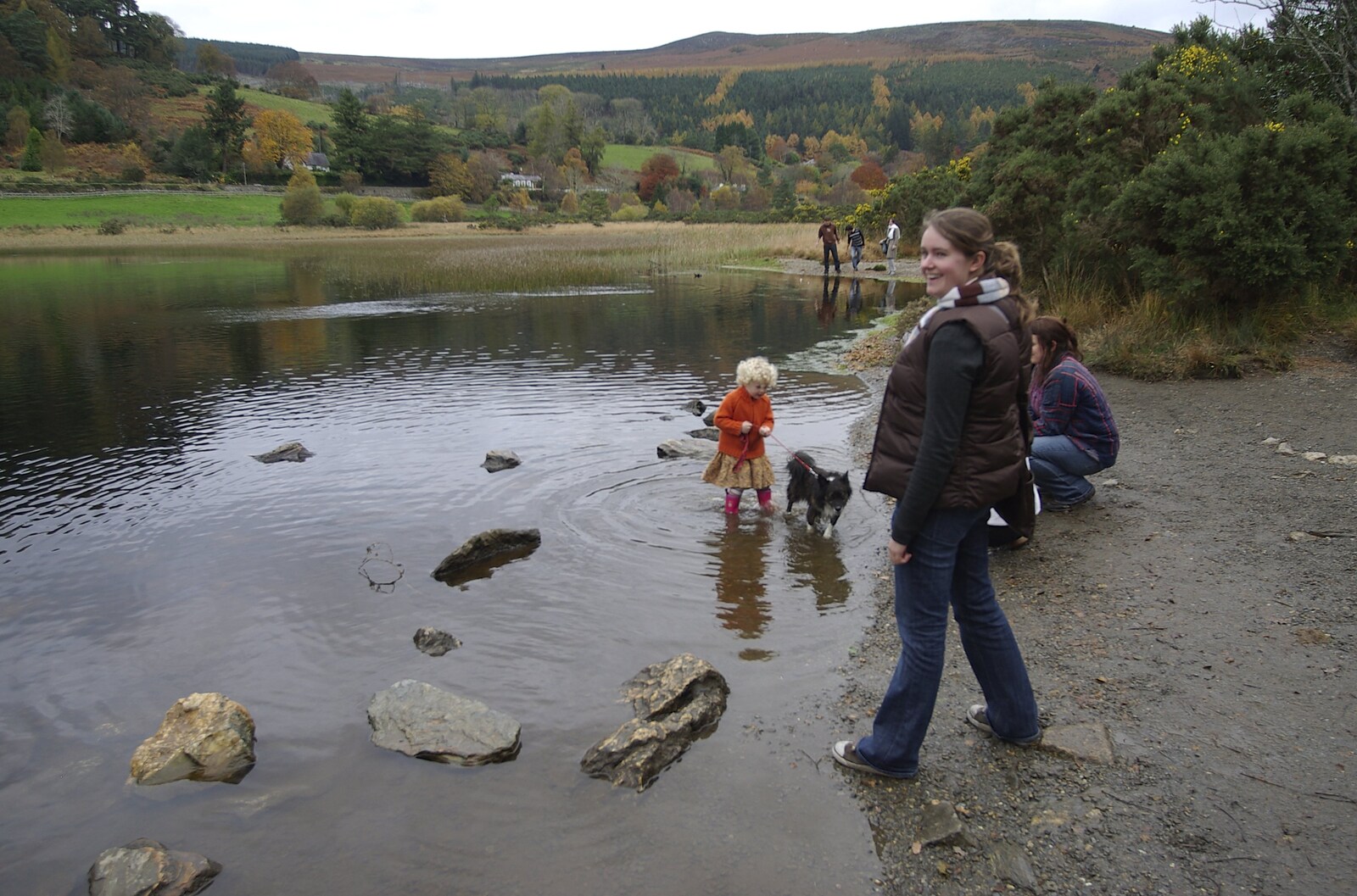 Reflections: A Day at Glendalough, County Wicklow, Ireland - 3rd November 2007: Isobel stands on the edge of the lake
