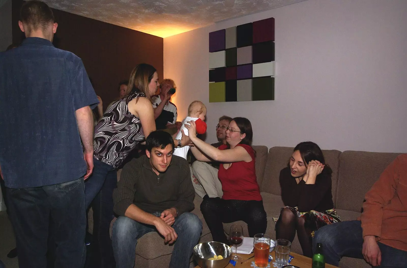 A baby is passed around as Will looks up, from Jen's Party and The Swan Inn's 24th, Brome, Suffolk - 10th November 2007