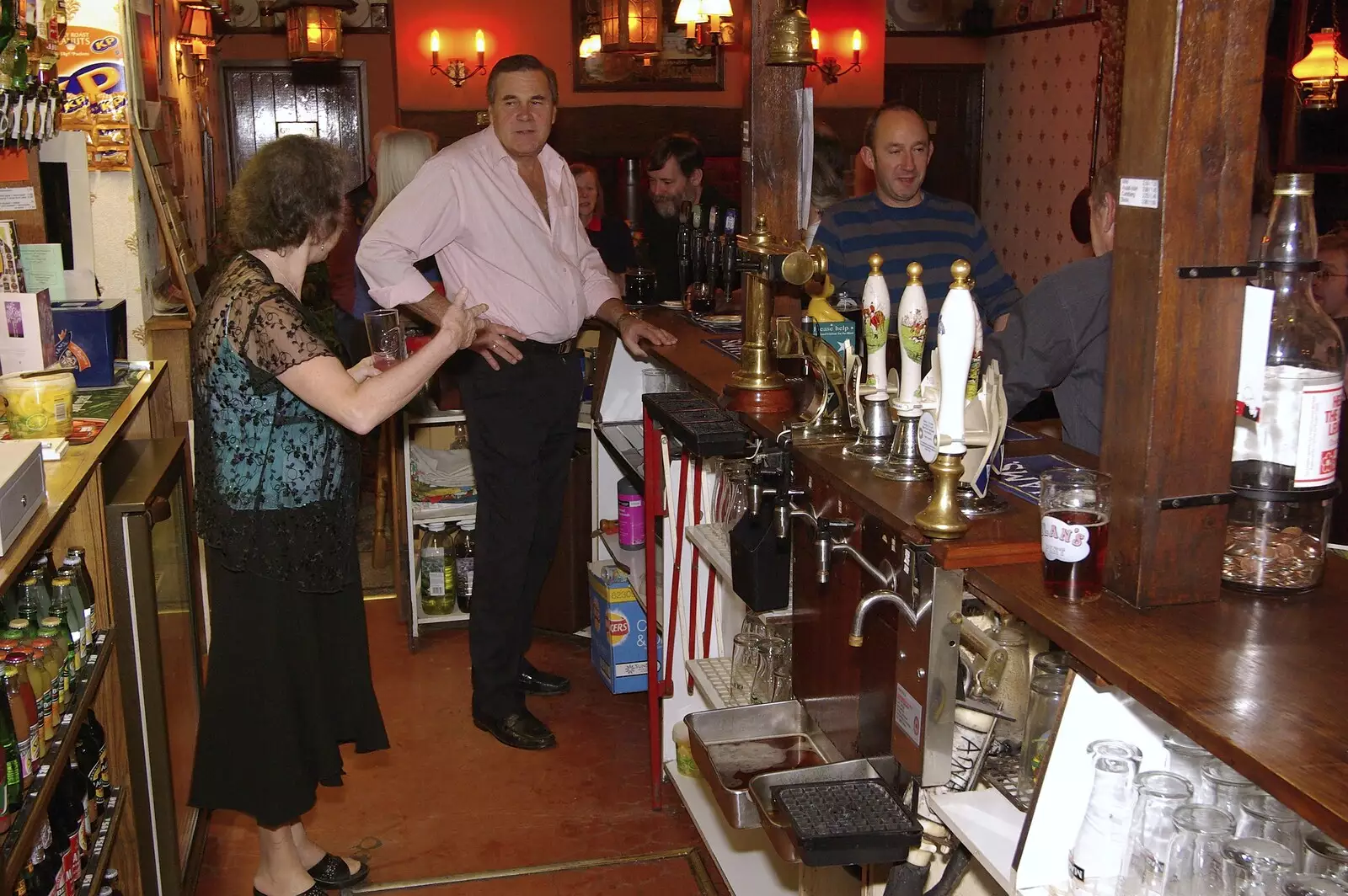 Sylvia and Alan behind their bar, from Jen's Party and The Swan Inn's 24th, Brome, Suffolk - 10th November 2007