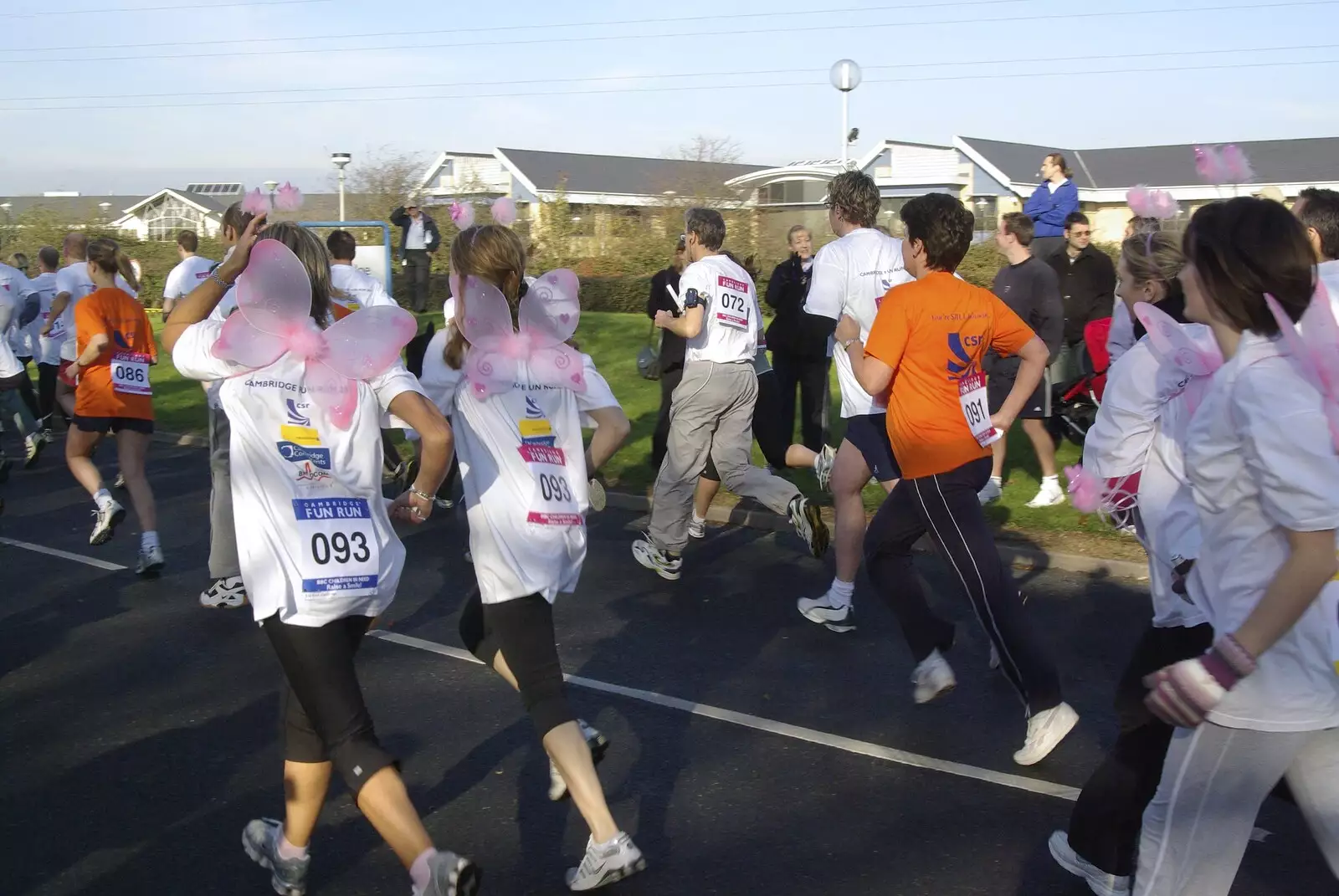 Some pink fairy wings head off, from Isobel and the Science Park Fun Run, Milton Road, Cambridge - 16th November 2007