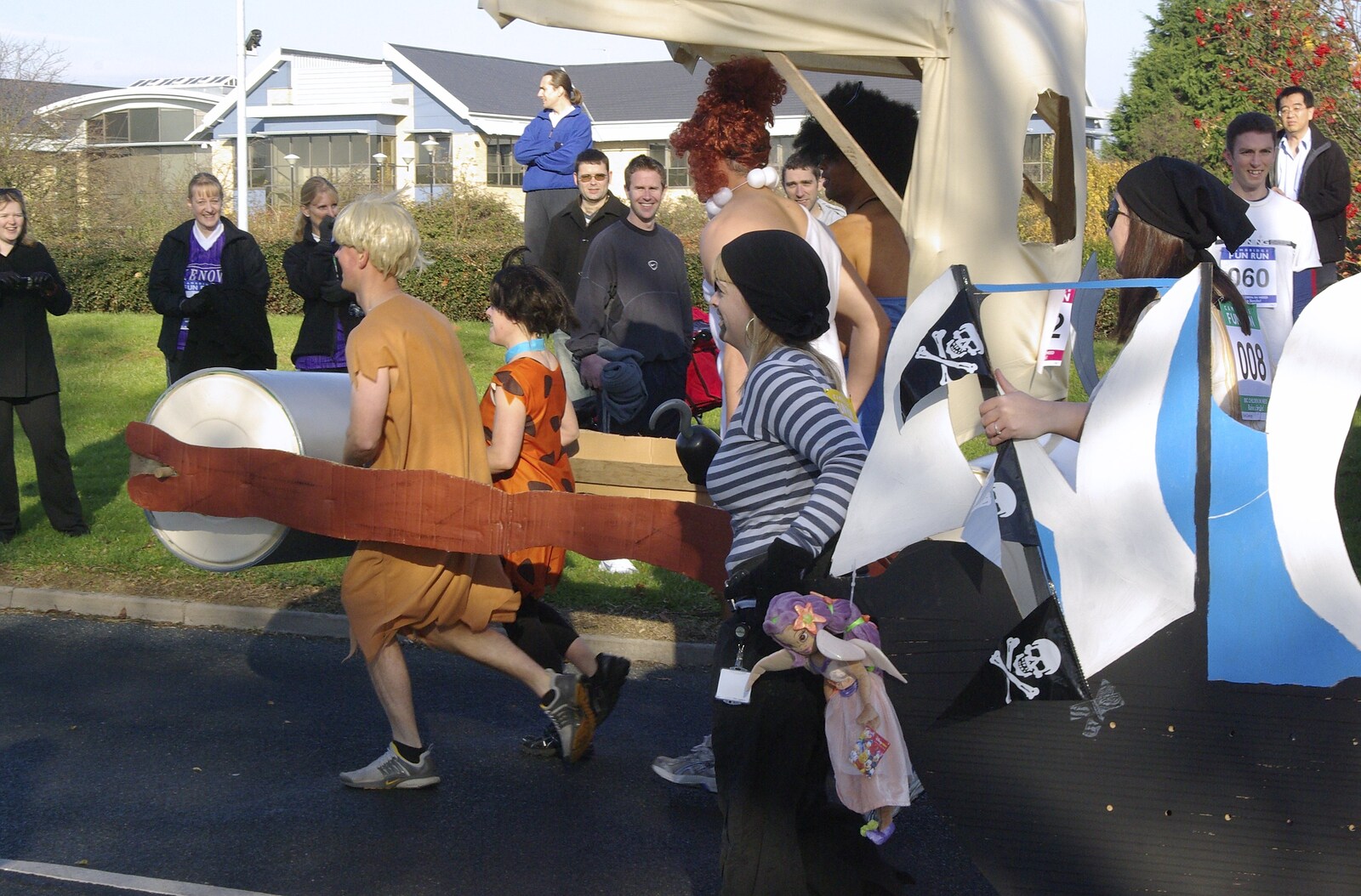Isobel and the Science Park Fun Run, Milton Road, Cambridge - 16th November 2007: A Flintstones team runs past