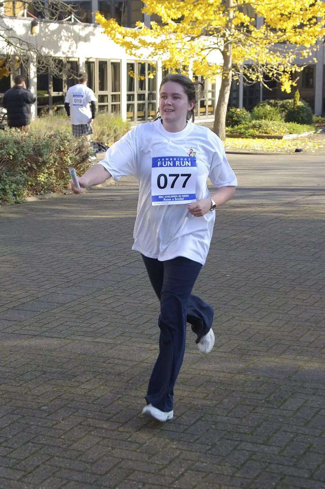 Isobel runs in to the finish, from Isobel and the Science Park Fun Run, Milton Road, Cambridge - 16th November 2007