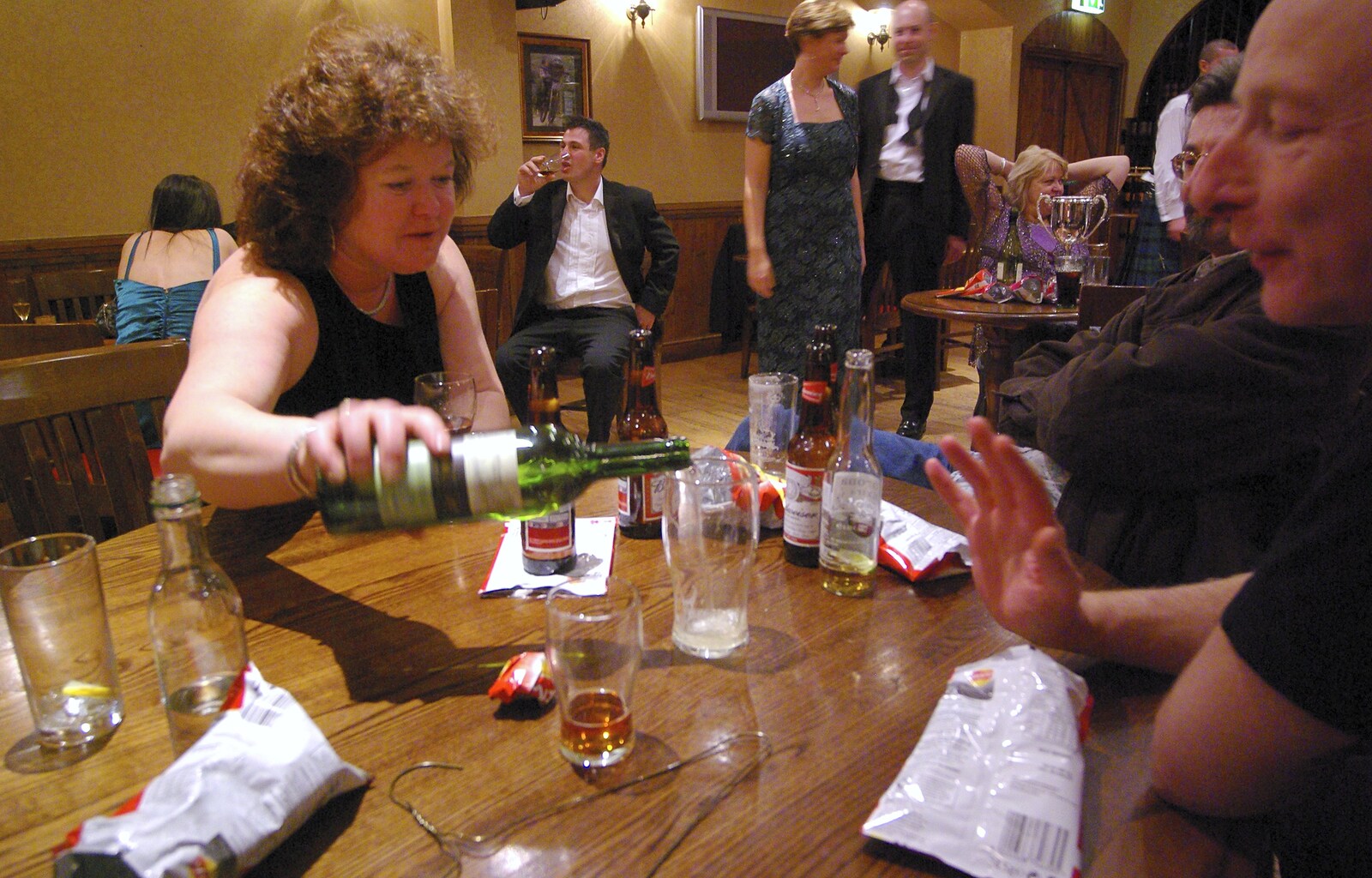 Jo pours some wine into a pint glass from The BBs On Tour, Gatwick Copthorne, West Sussex - 24th November 2007