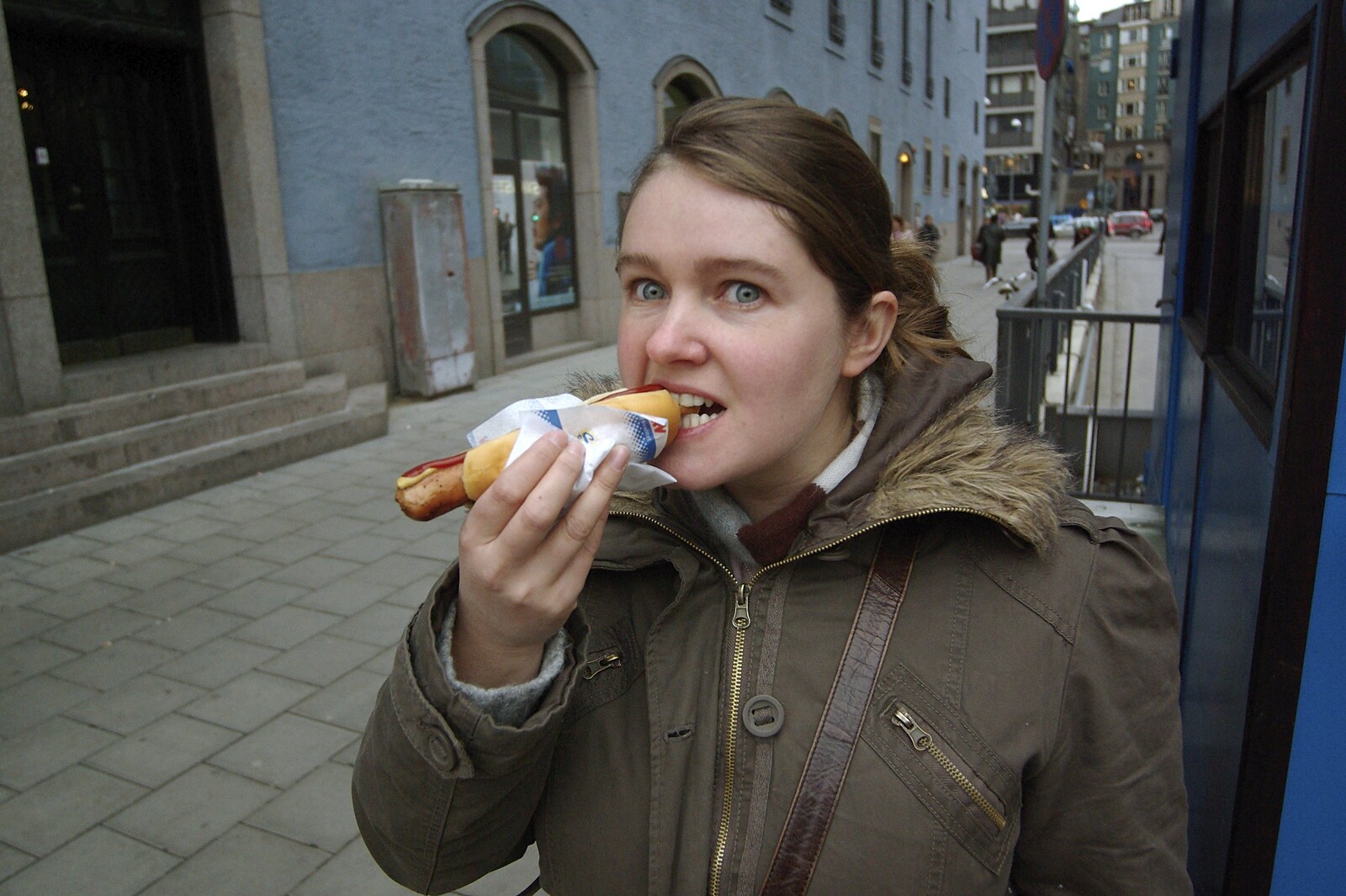 Isobel tucks in to a tasty sausage snack from Gamla Stan, Stockholm, Sweden - 15th December 2007