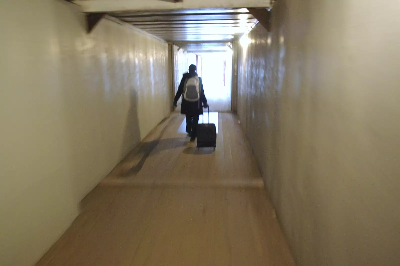 A wheelie trolley is pulled through a steel tunnel, from A Few Hours in Skansen, Stockholm, Sweden - 17th December 2007