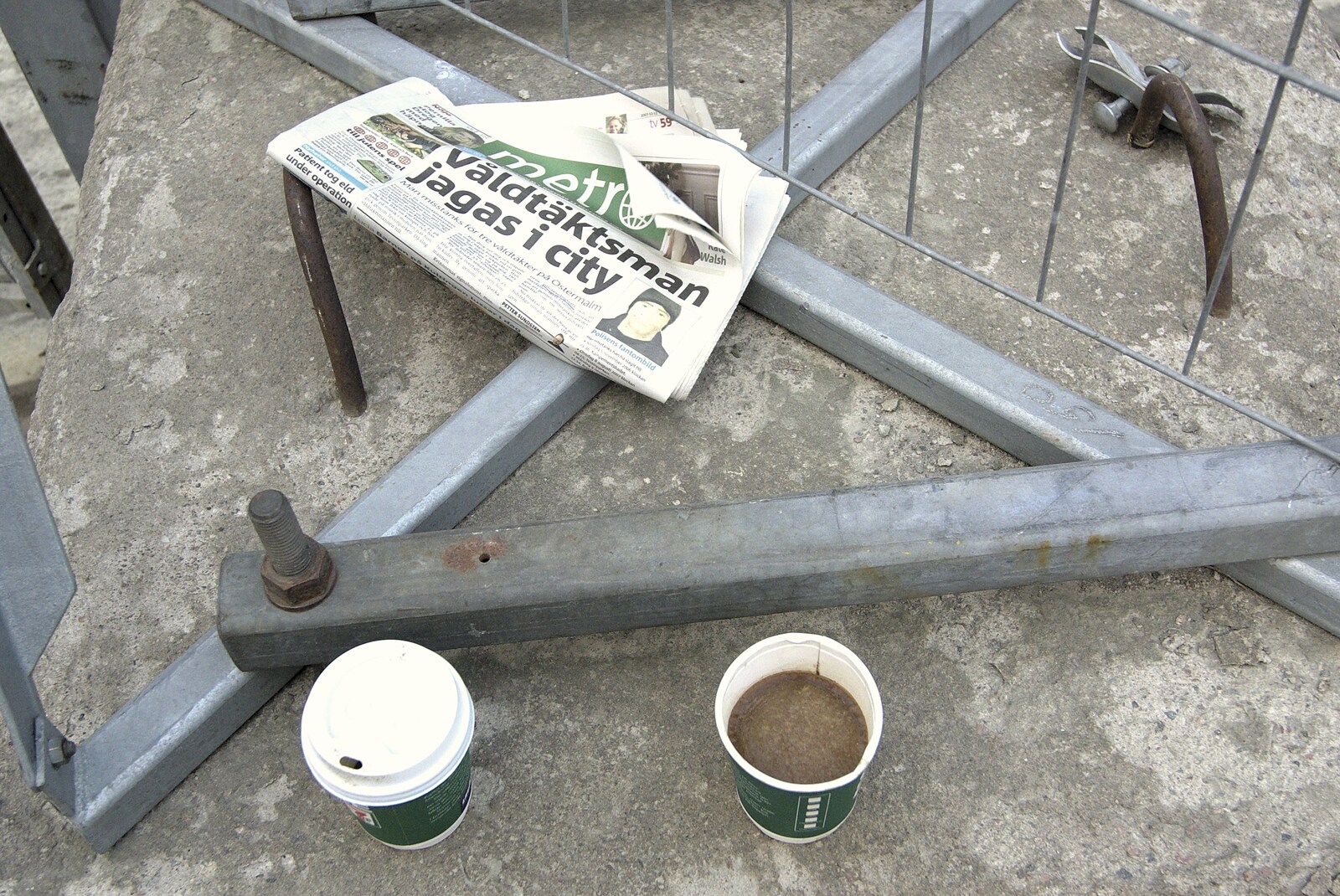 A discarded newspaper and frozen coffee from A Few Hours in Skansen, Stockholm, Sweden - 17th December 2007