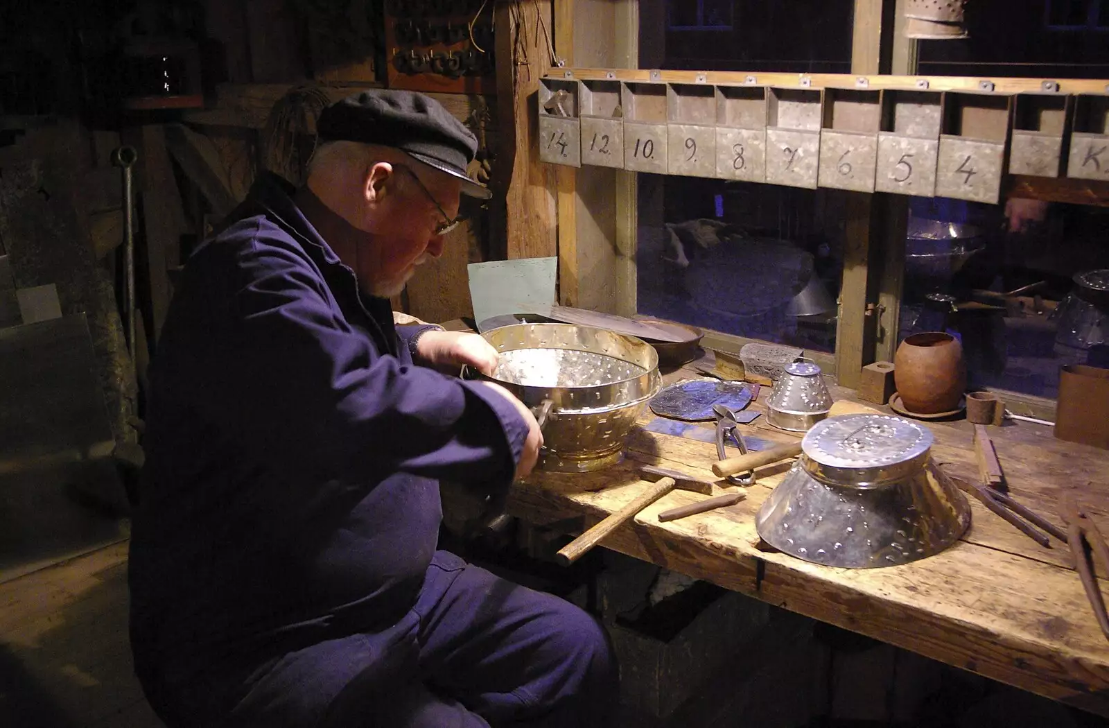 A dude does some tin work, from A Few Hours in Skansen, Stockholm, Sweden - 17th December 2007