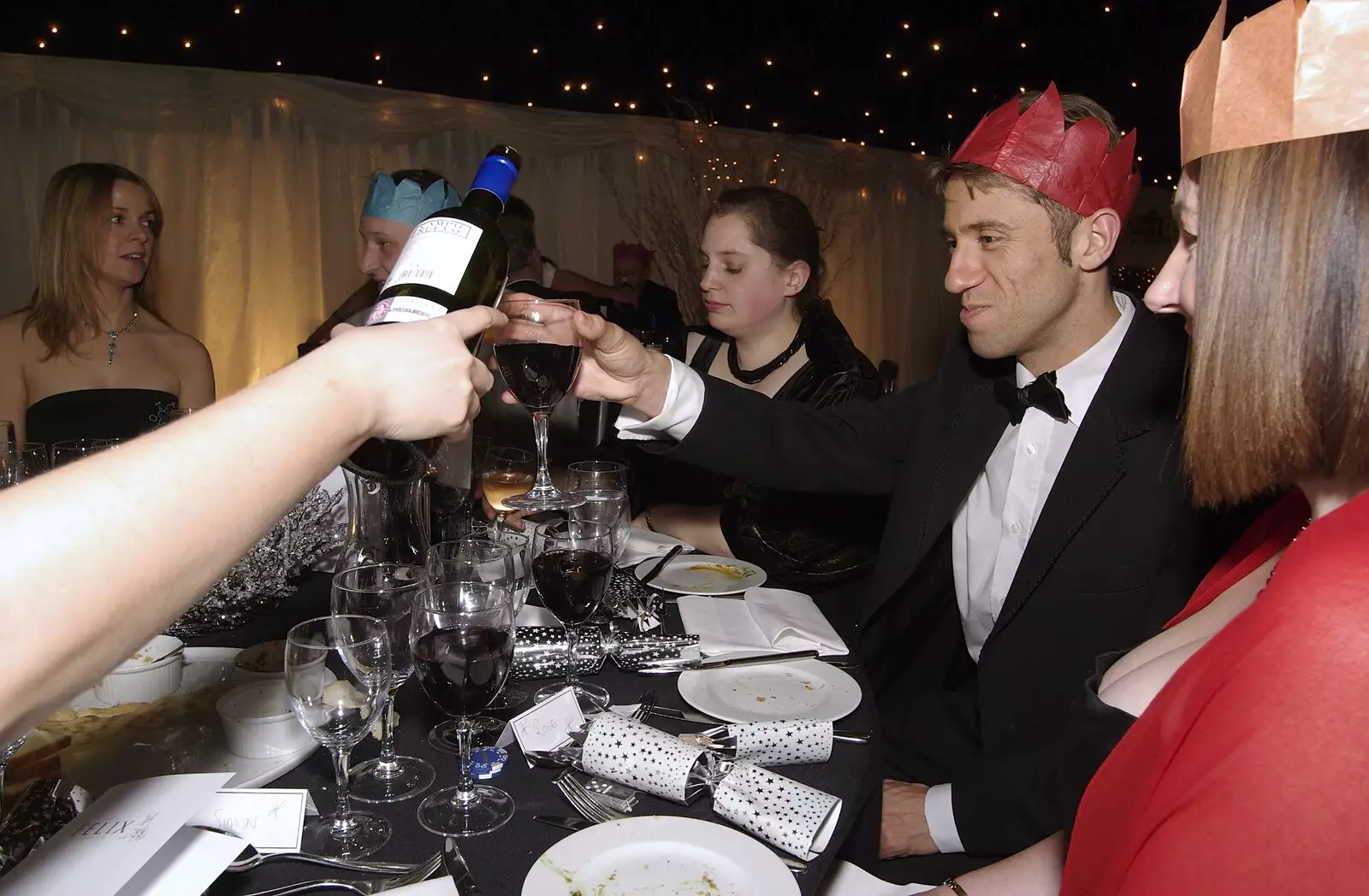 Andrew gets more wine, from Qualcomm Cambridge's Christmas, Hotel Felix, Cambridge - 20th December 2007