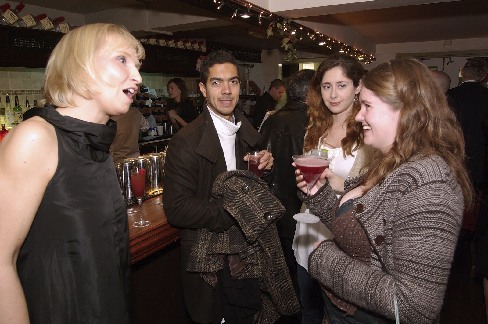 Isobel has a cosmopolitan from Taptu's Christmas Bash, La Raza, Cambridge - 21st December 2007