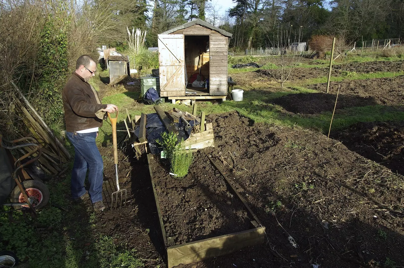 Matt inspects his herbs, from Matt's Allotment and Meldon Hill, Chagford, Devon - 26th December 2007