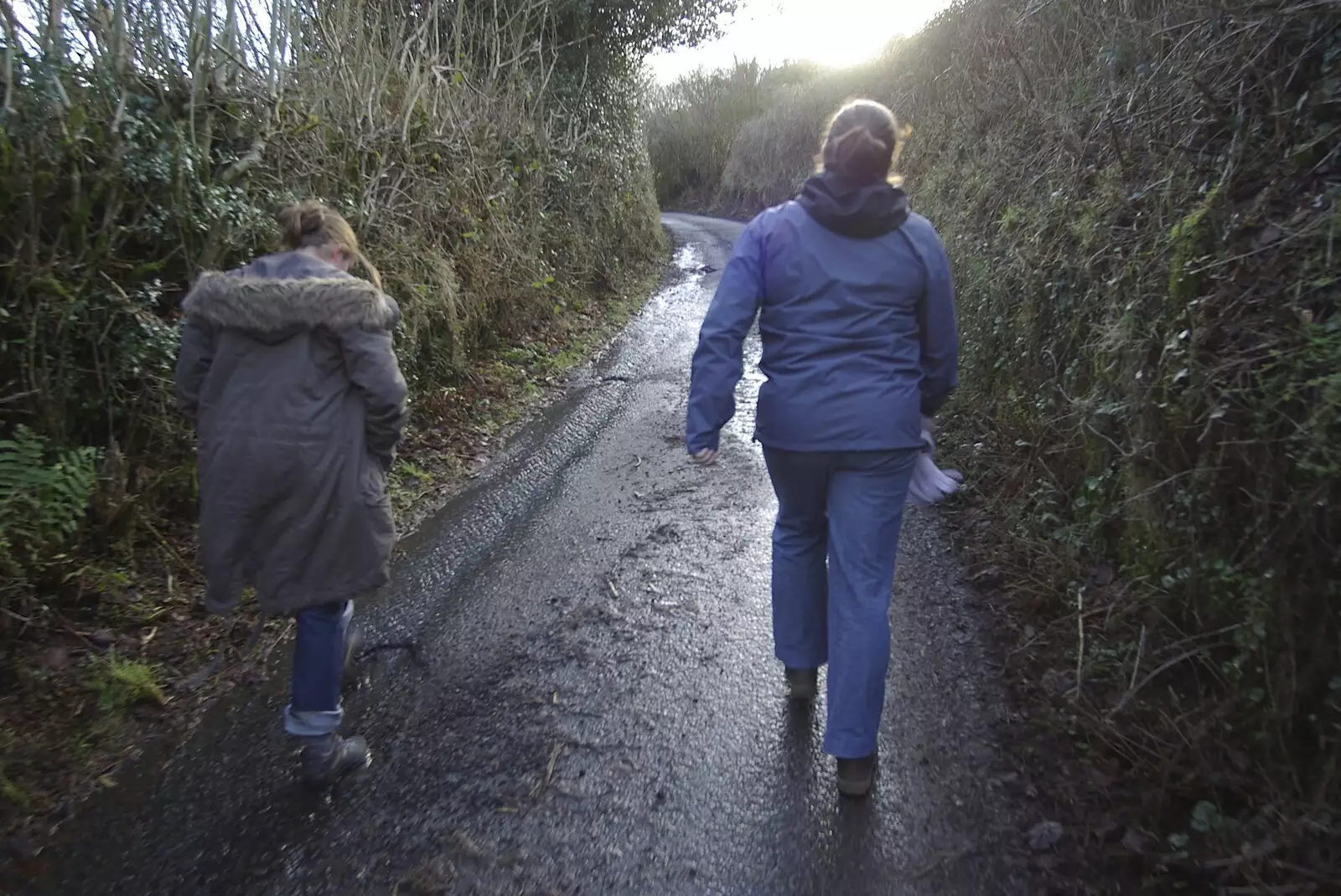 Isobel and Sis stride up the hill, from Matt's Allotment and Meldon Hill, Chagford, Devon - 26th December 2007