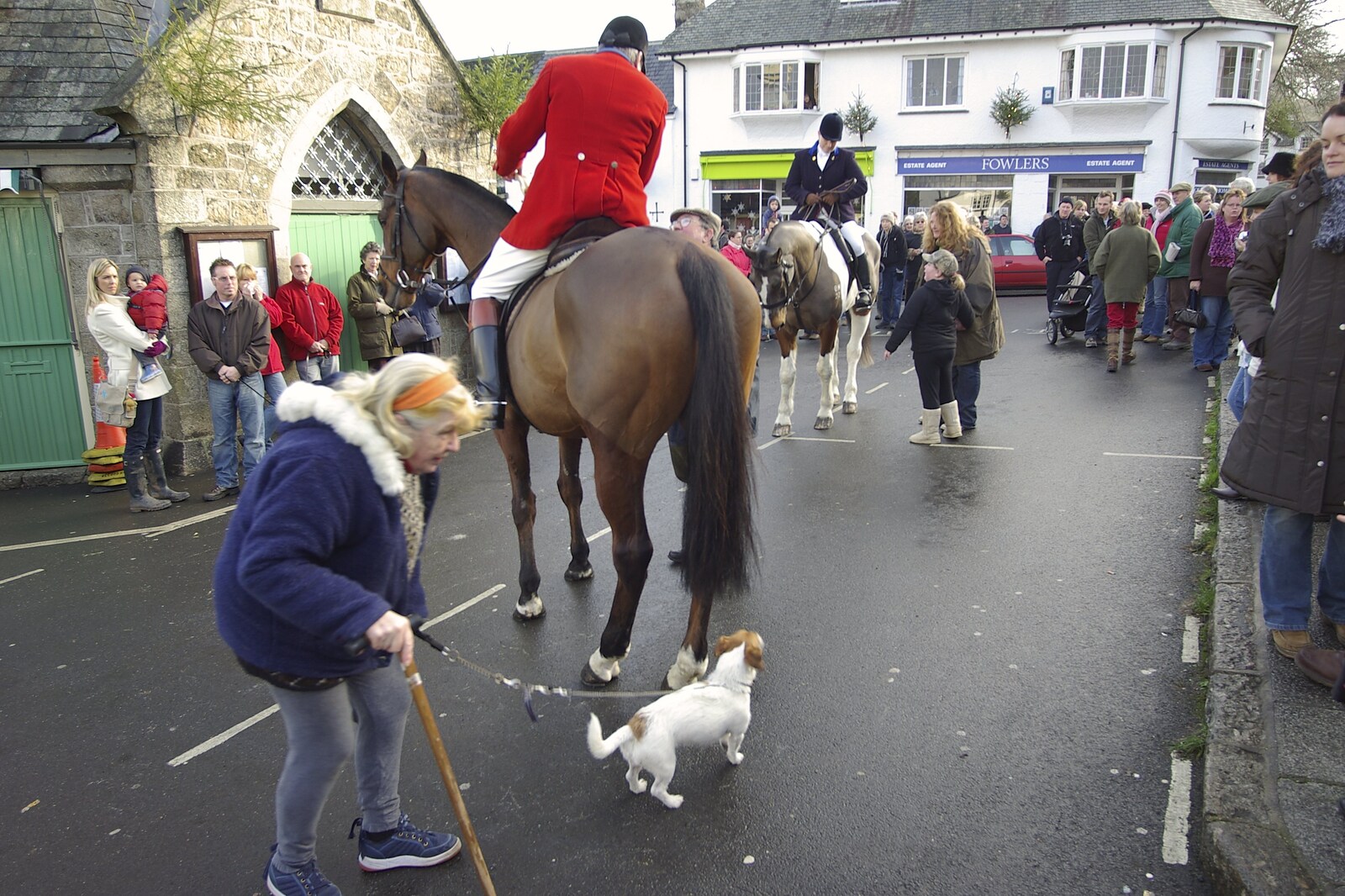 The woman and dog wander off from A Boxing Day Hunt, Chagford, Devon - 26th December 2007