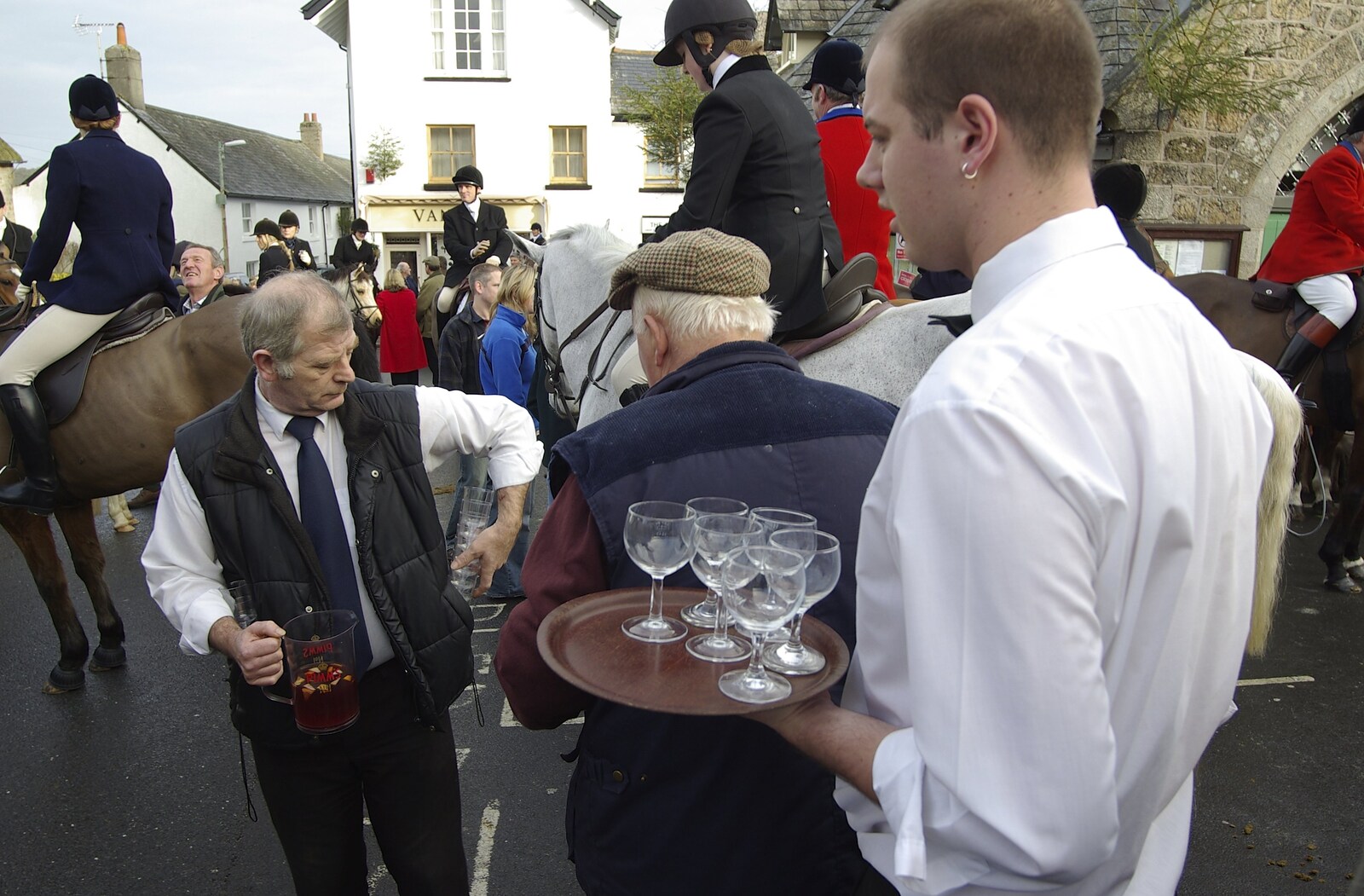 A barman collects glasses from A Boxing Day Hunt, Chagford, Devon - 26th December 2007