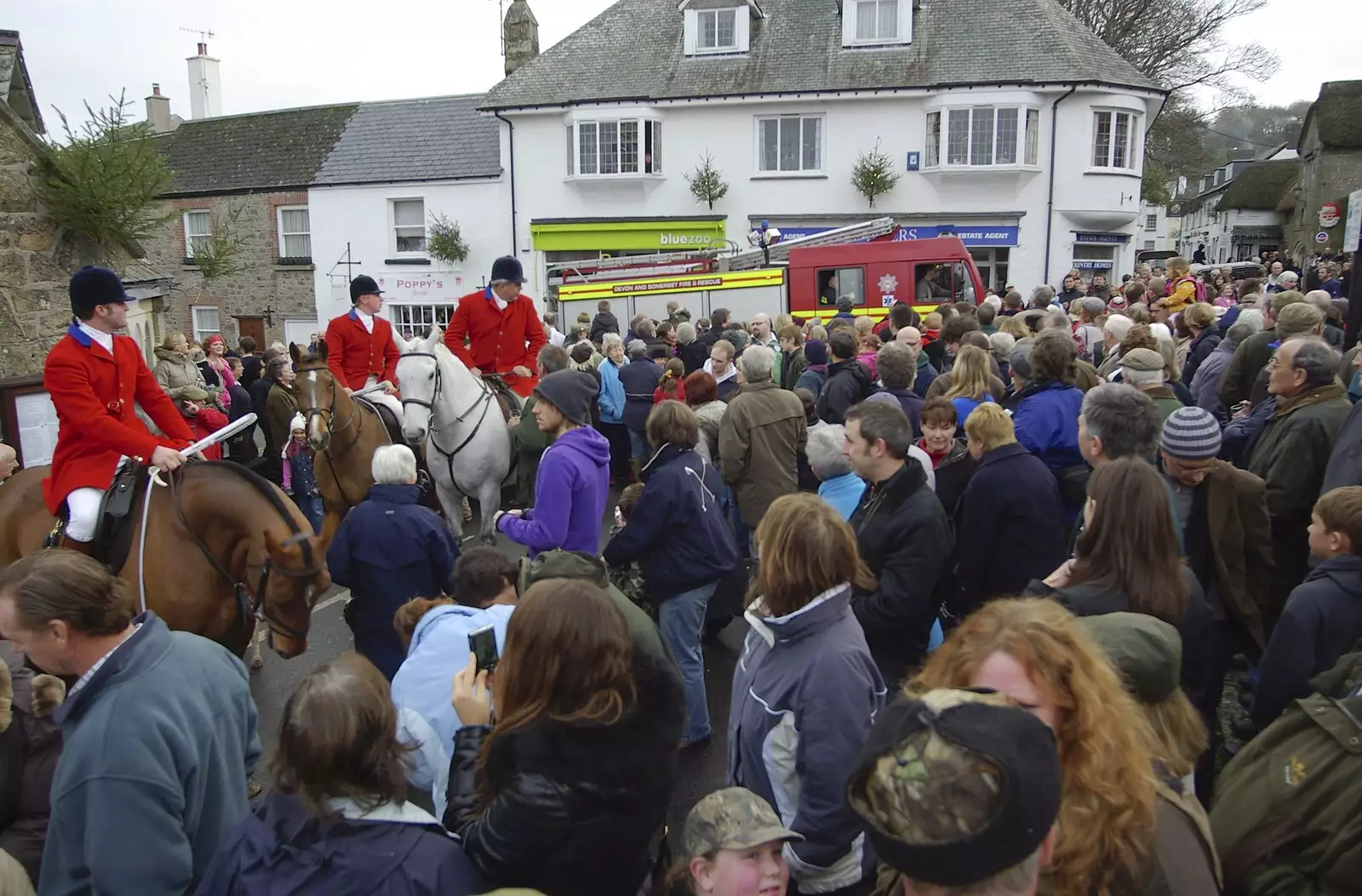 A fire engine squeezes through the crowds, from A Boxing Day Hunt, Chagford, Devon - 26th December 2007