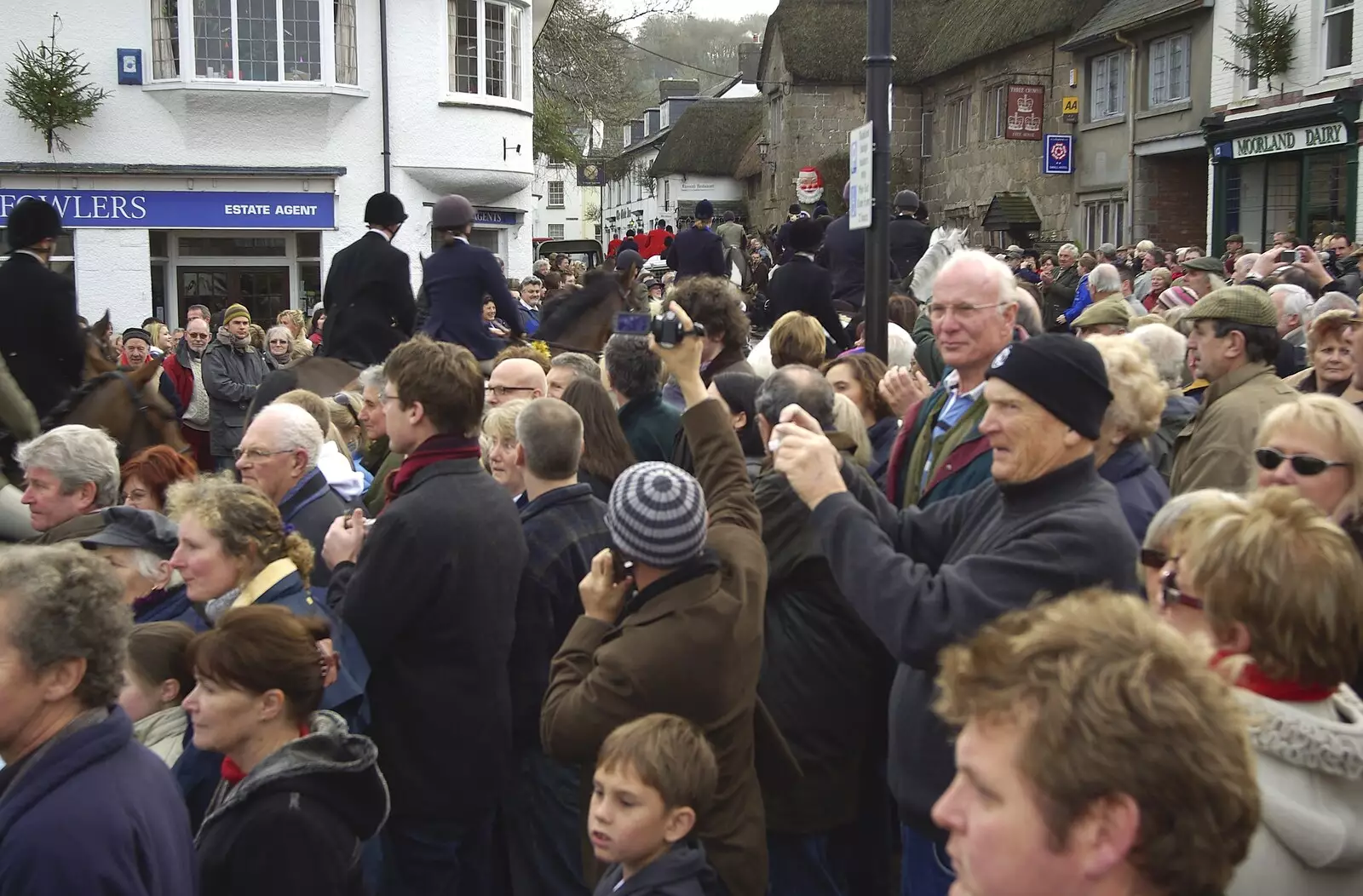 The hunt disappears up Mill Street, from A Boxing Day Hunt, Chagford, Devon - 26th December 2007