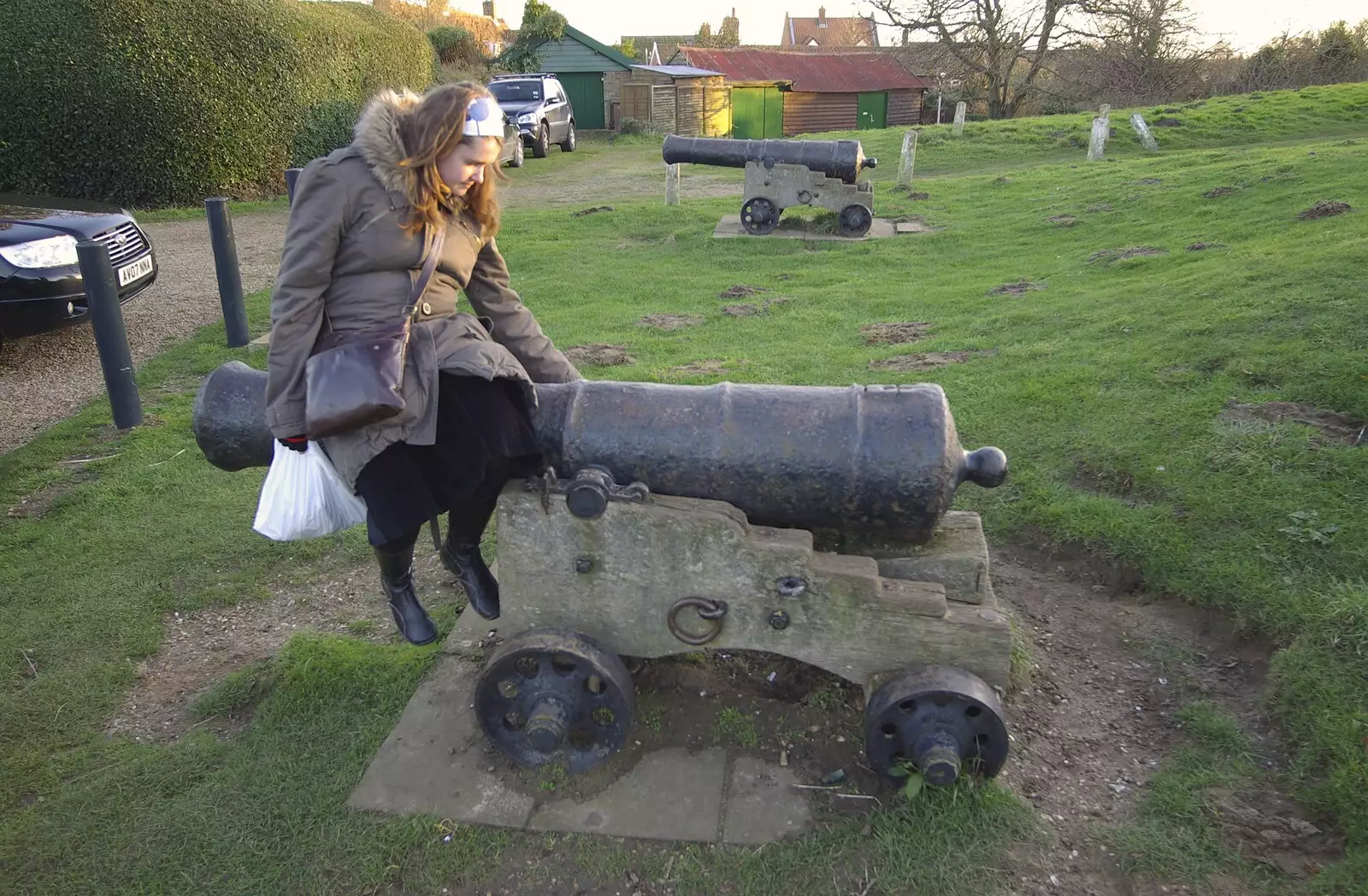 Isobel sits on a cannon, from A Post-Christmas Trip to Orford, Suffolk - 29th December 2007