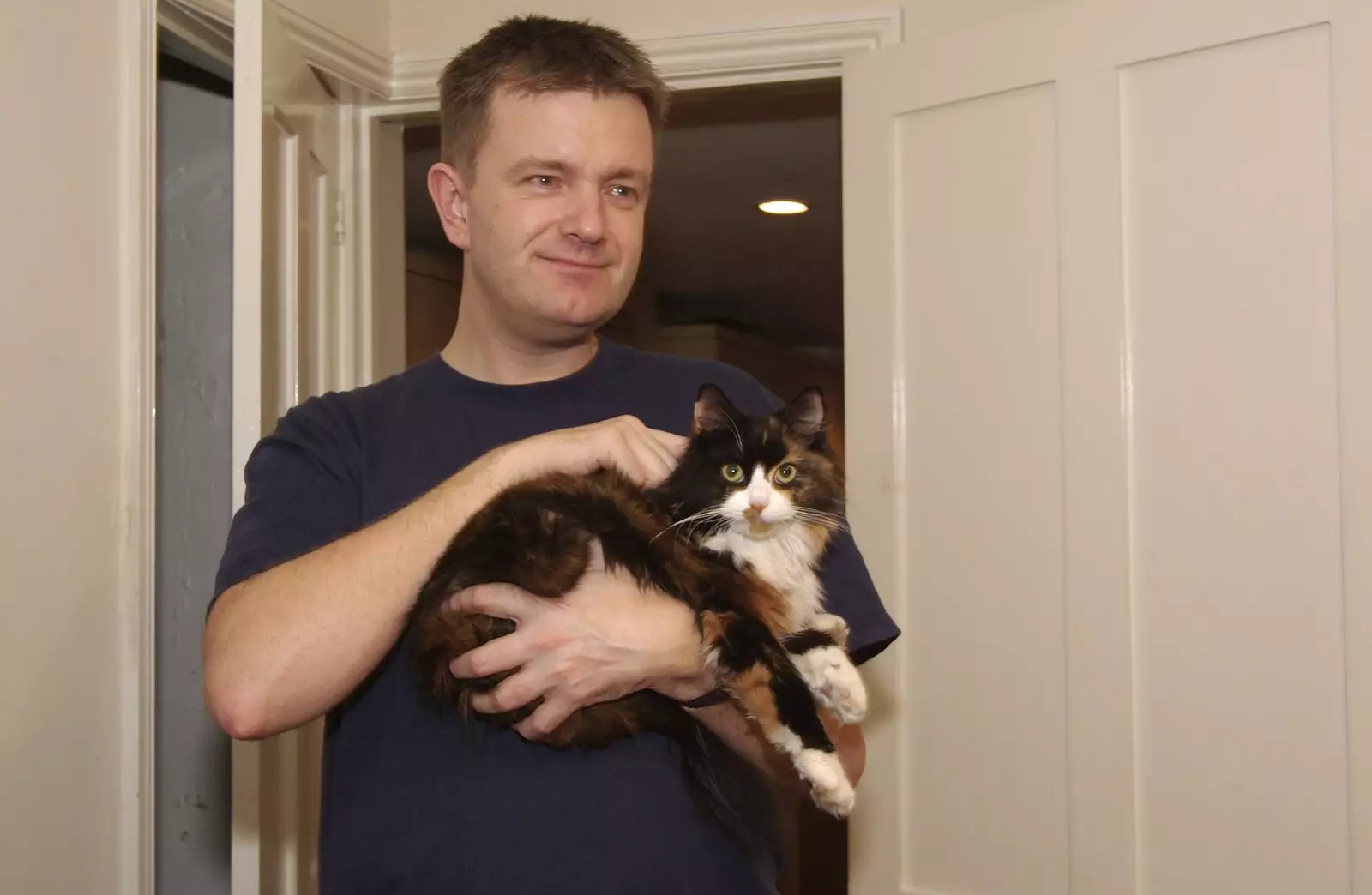 Nosher holds the cat for a bit, from Thai with Rachel and Sam, and Steve's Taptu Birthday Cake, Cambridge - 12th January 2008