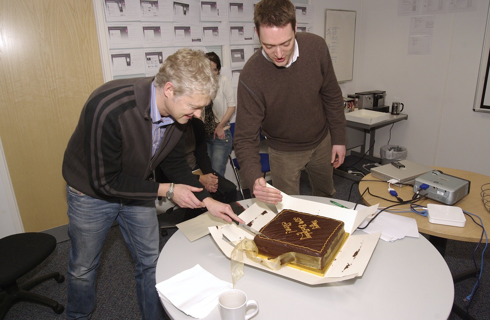 Thai with Rachel and Sam, and Steve's Taptu Birthday Cake, Cambridge - 12th January 2008: Steve gives the cake a chop