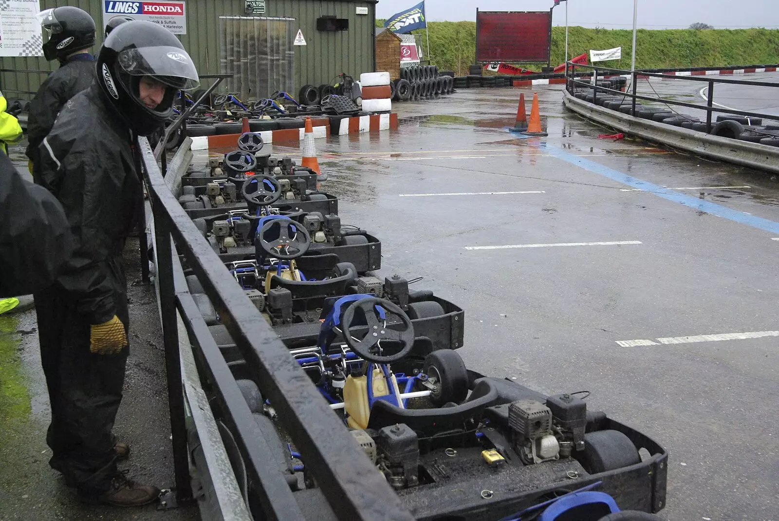 Outside, where the karts are lined up, from Gov's Stag-Day Karting, Ellough Airfield, Beccles, Suffolk - 19th January 2008