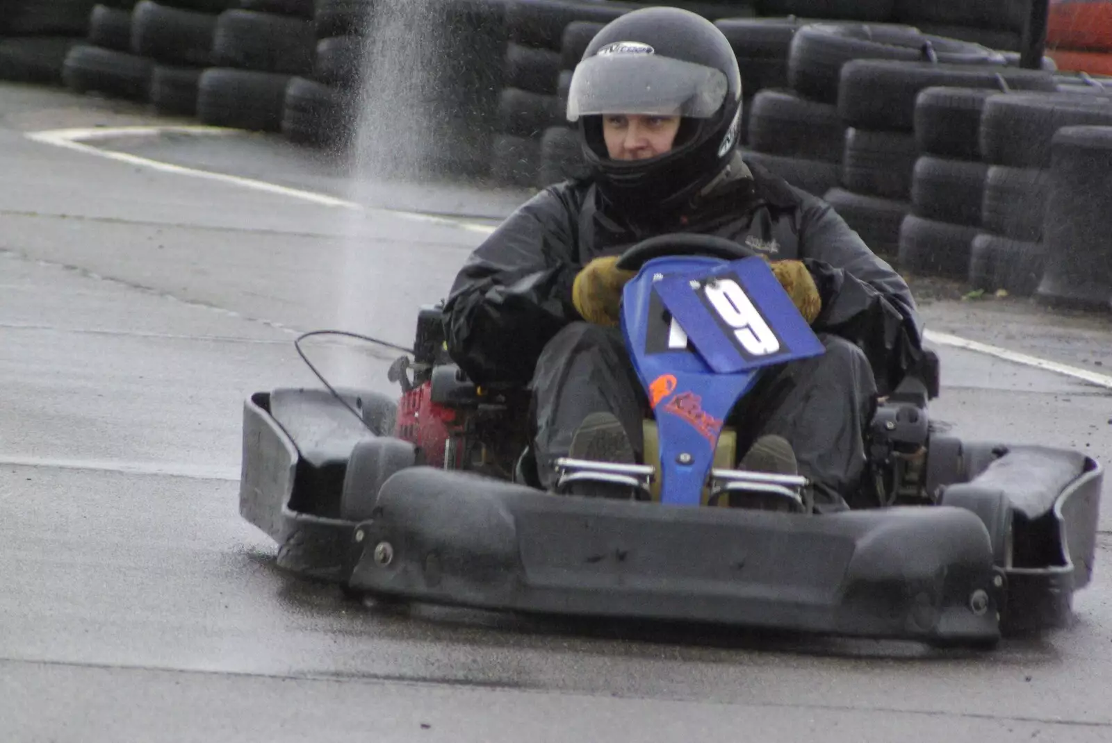 A jet of water sprays up from the rear wheels, from Gov's Stag-Day Karting, Ellough Airfield, Beccles, Suffolk - 19th January 2008