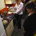 2008 Rachel does fondue as Isobel looks on
