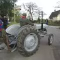 The tractor pulls out onto the street, Gov and Rachel's Wedding, Thorndon, Suffolk - 2nd February 2008