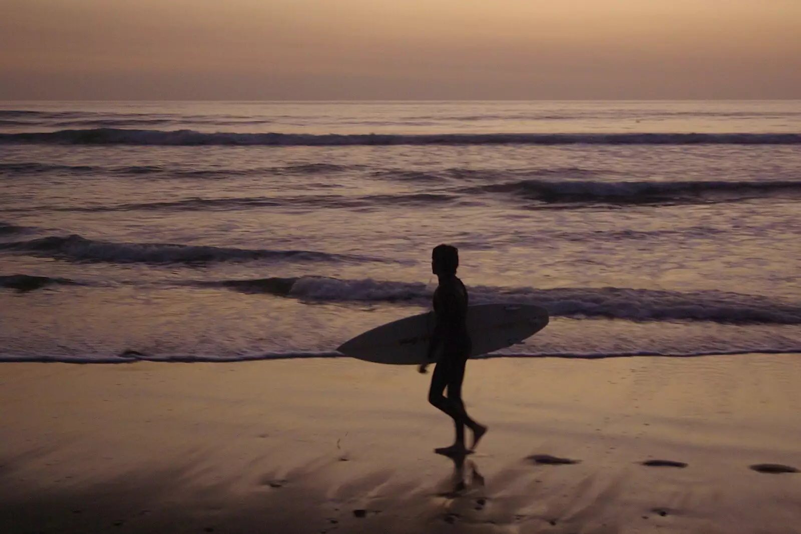 A surfer leaves a trail of footprints in the sand, from San Diego 8: The Beaches of Torrey Pines, and Ramona, California, USA - 29th February 2008