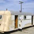 The remains of an airstream-like caravan