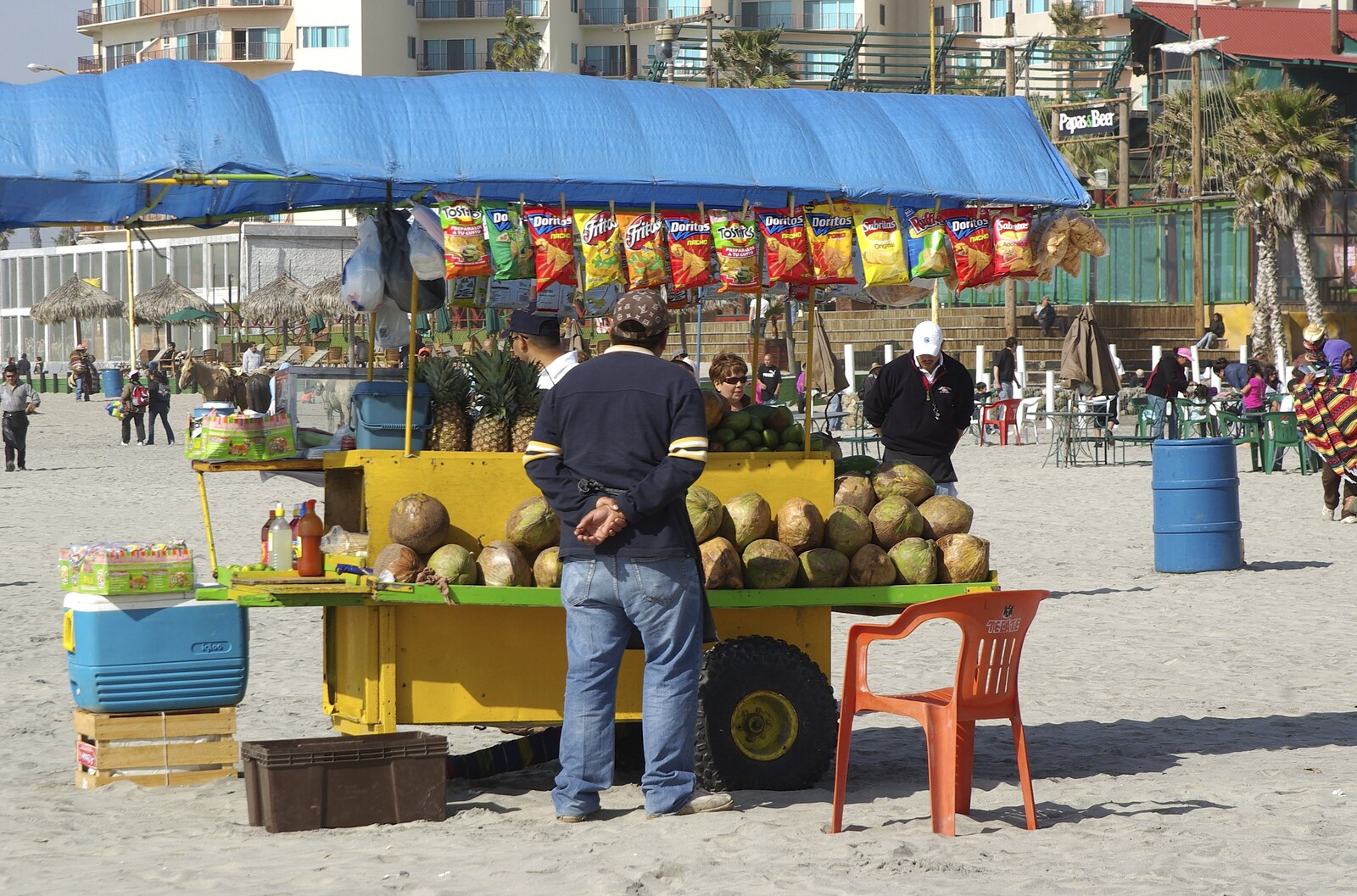 Rosarito and Tijuana, Baja California, Mexico - 2nd March 2008: Fruit and crisps seller
