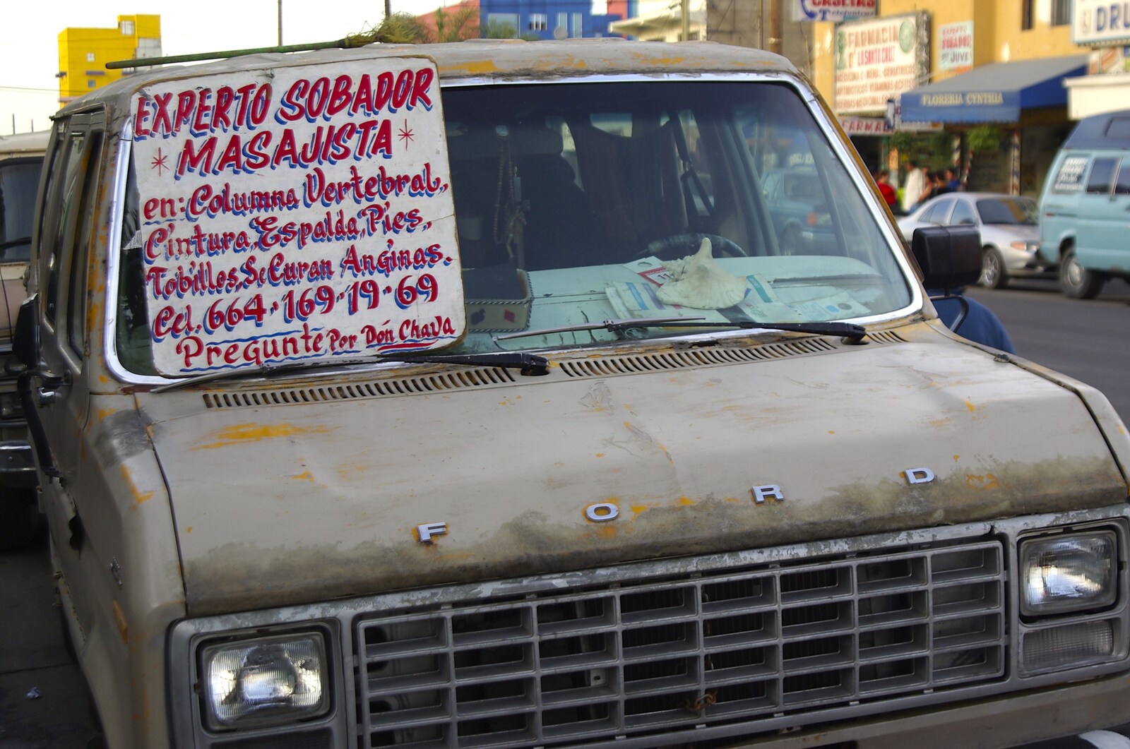 Rosarito and Tijuana, Baja California, Mexico - 2nd March 2008: A beat-up Ford van displays some sort of advert