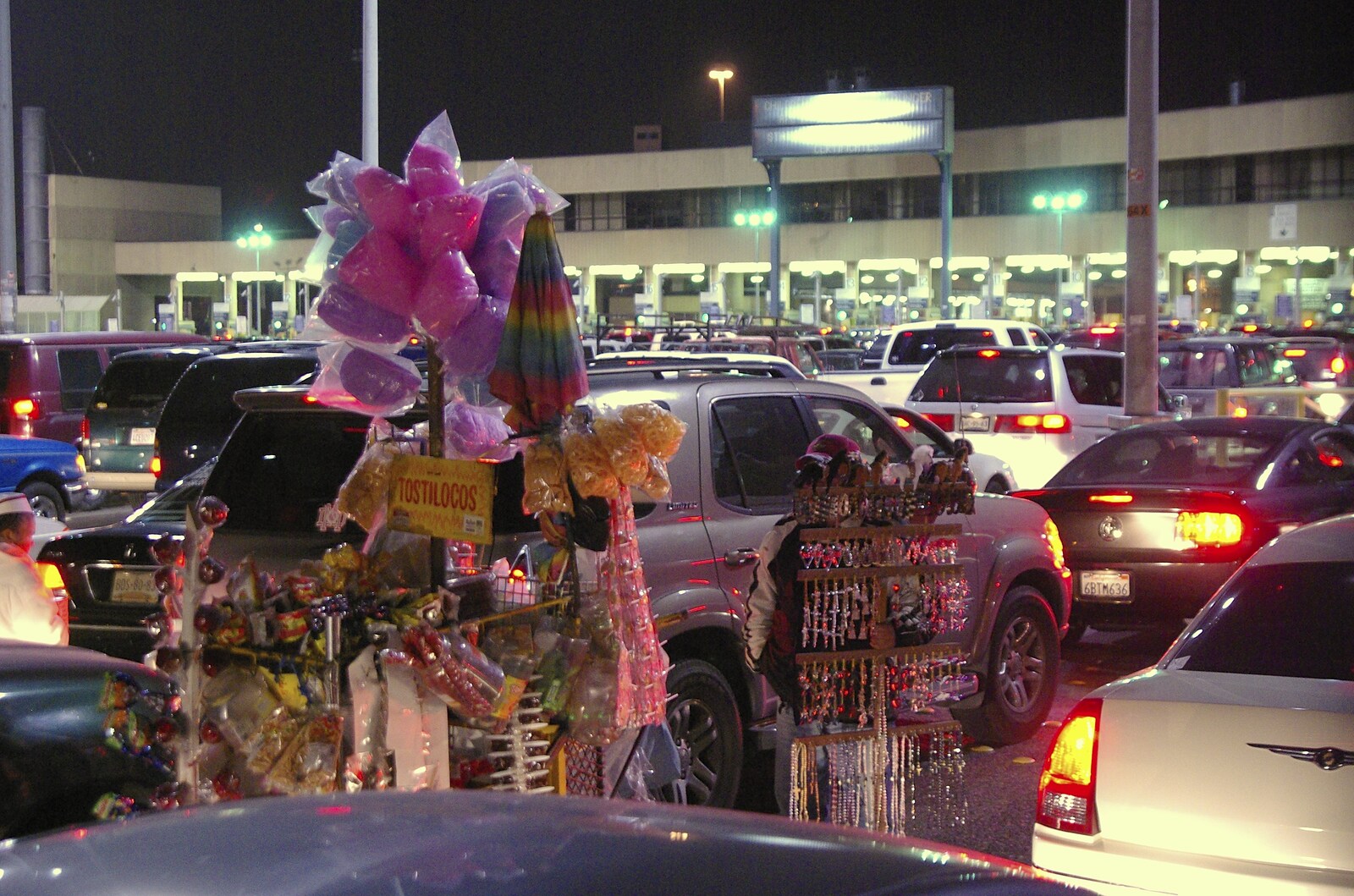 Rosarito and Tijuana, Baja California, Mexico - 2nd March 2008: Street vendors ply their wares amongst queued cars
