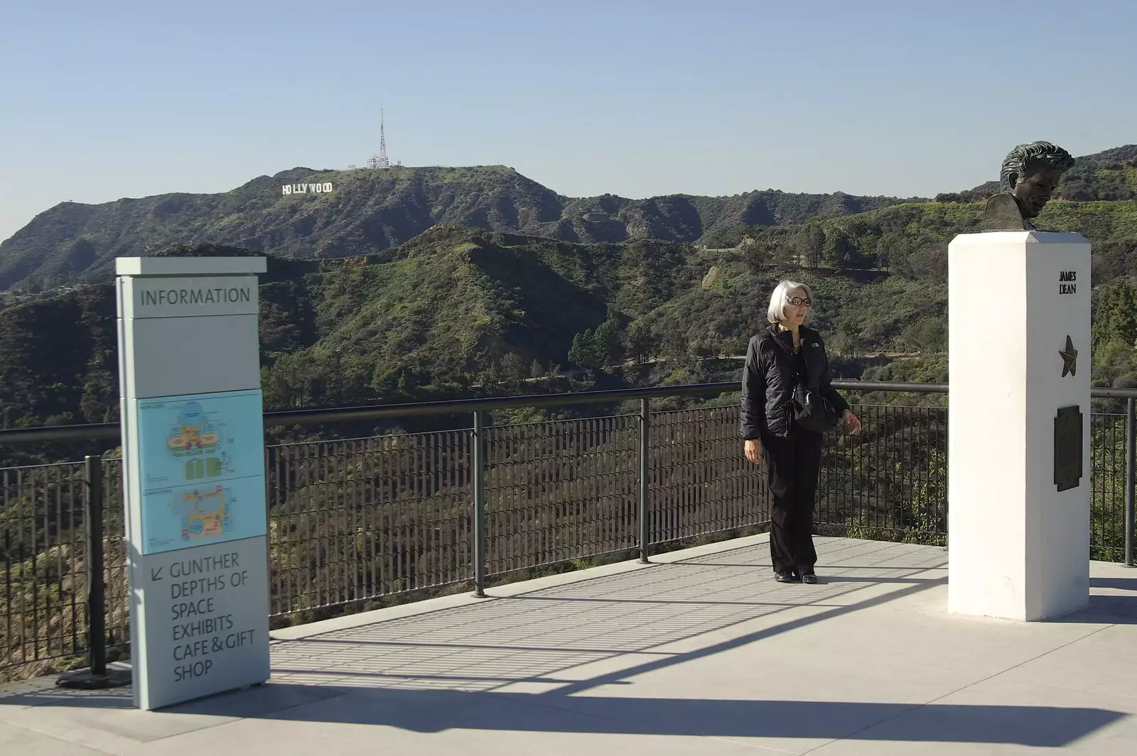 A tourist gawps at the James Dean statue, from San Diego and Hollywood, California, US - 3rd March 2008