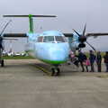 The FlyBE Dash 8 loads up on the tarmac, Easter in Dublin, Ireland - 21st March 2008