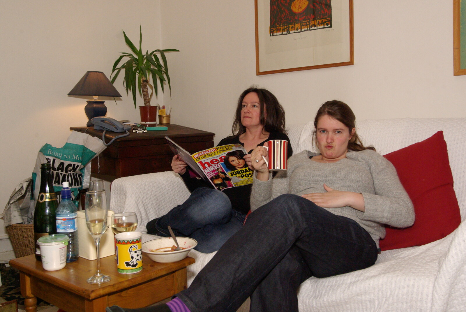 Easter in Dublin, Ireland - 21st March 2008: Evelyn reads a trashy magazine as Isobel has tea