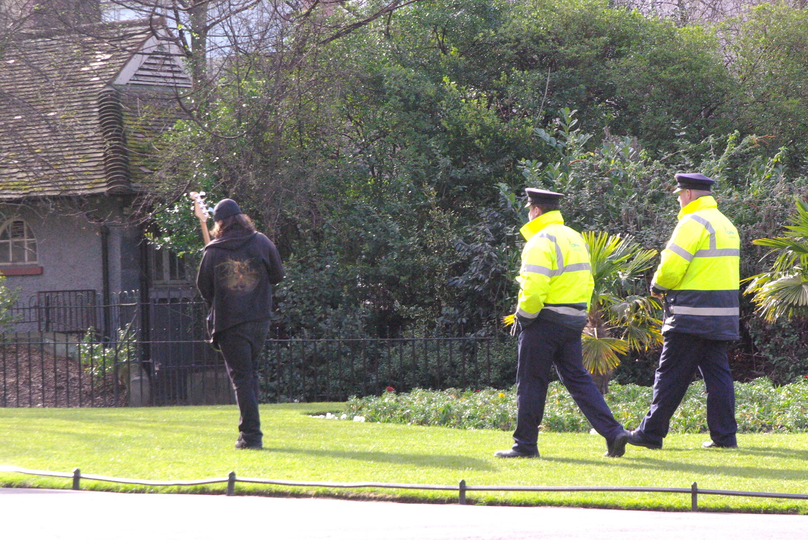 Easter in Dublin, Ireland - 21st March 2008: The Gardai hassle a dude who's waving a guitar