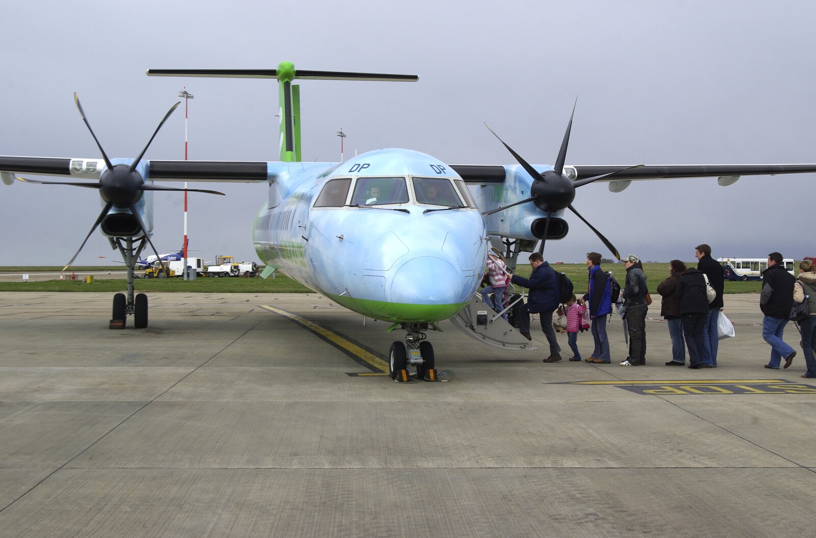 The FlyBe Dash 8 loads up on the tarmac from Easter in Dublin, Ireland - 21st March 2008