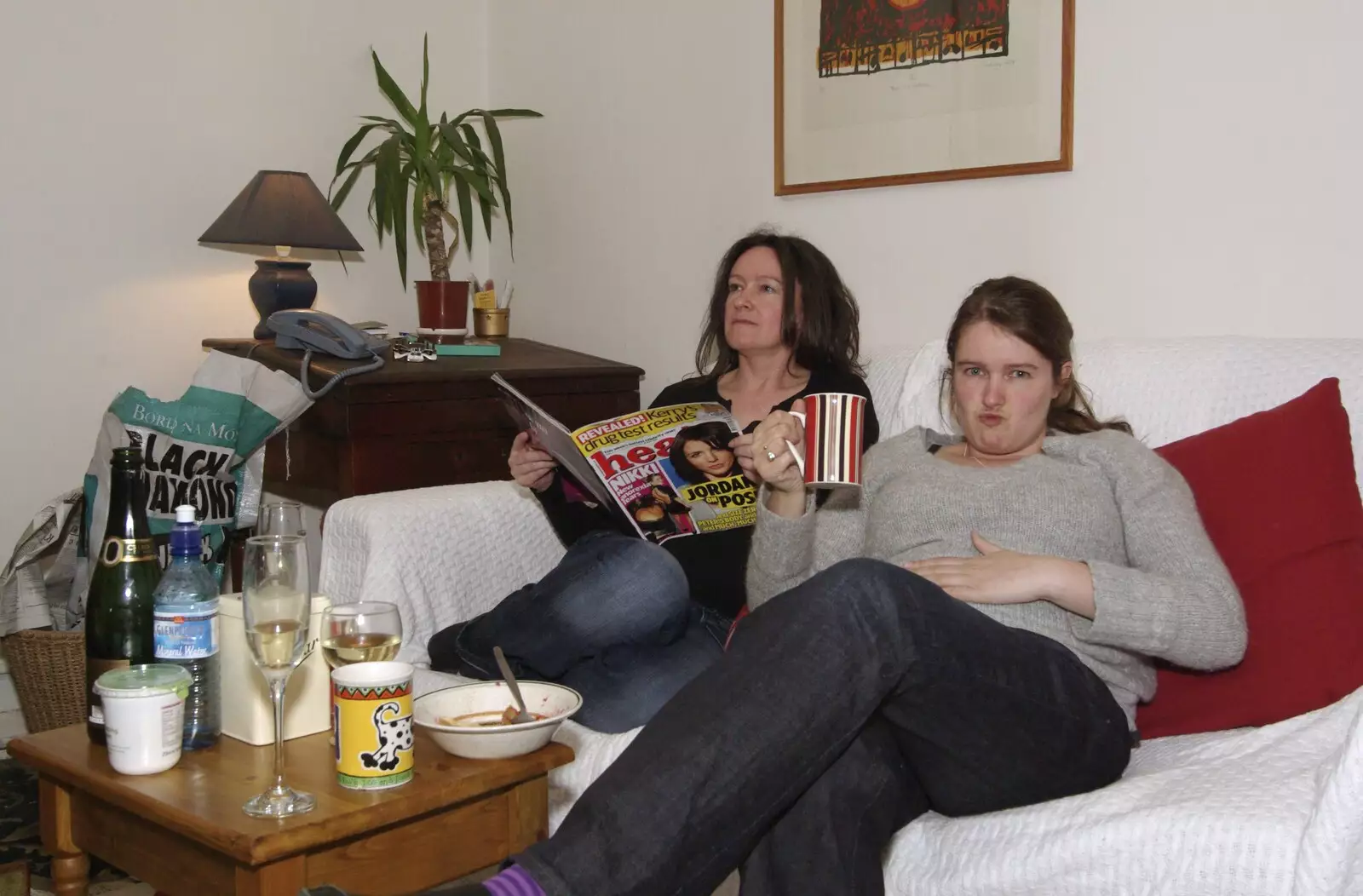 Evelyn reads a trashy magazine as Isobel has tea, from Easter in Dublin, Ireland - 21st March 2008