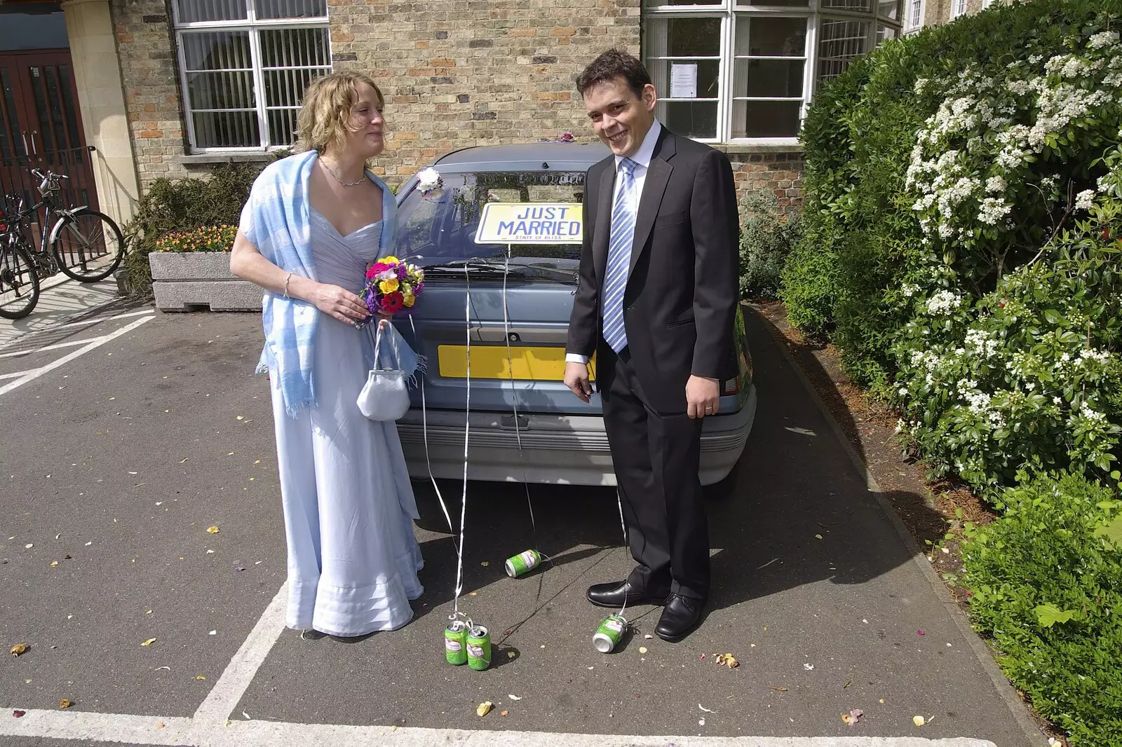 Anne and Hani inspect the cans, from Hani and Anne's Wedding, County Hall, Cambridge - 2nd May 2008