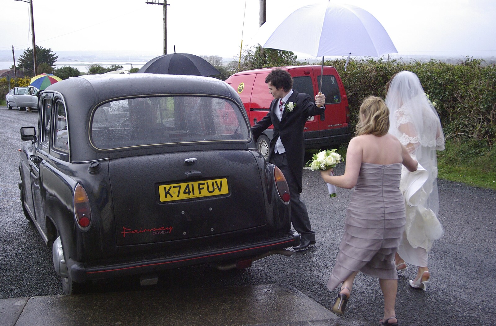 Paul and Jenny's Wedding, Tralee, County Kerry, Ireland - 3rd May 2008: The couple get into a British taxi