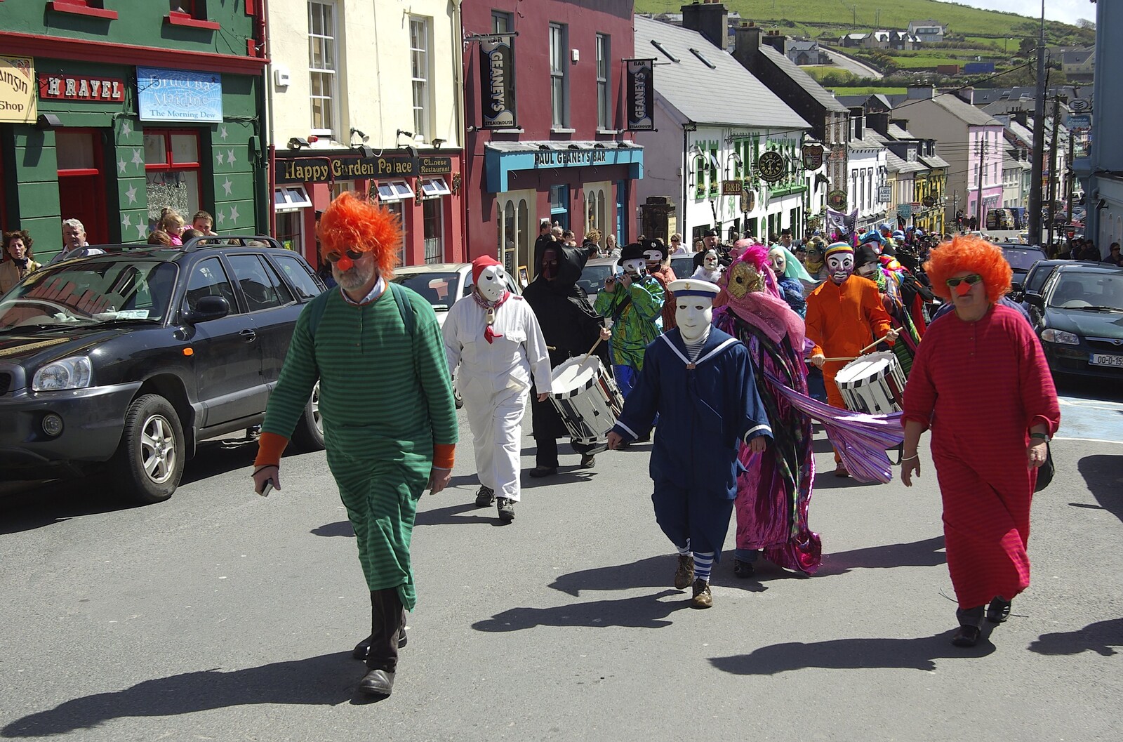 Connor Pass, Slea Head and Dingle, County Kerry, Ireland - 4th May 2008: Some clowns climb up Main Street