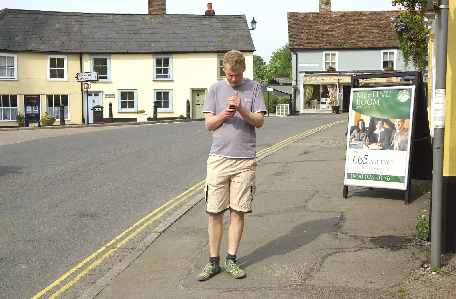 Bill checks up for any text messages, from The BSCC Weekend Away, Thaxted, Essex - 10th May 2008