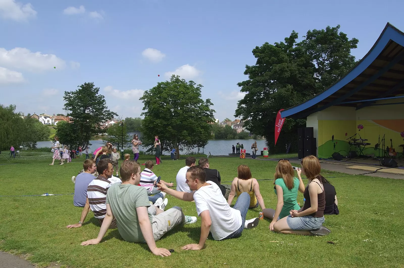 A group of teenagers hang out, enjoy the music and text each other, from Morris Dancing, and Rick Wakeman Opens the Park Pavillion Mural, Diss, Norfolk - 30th May 2008